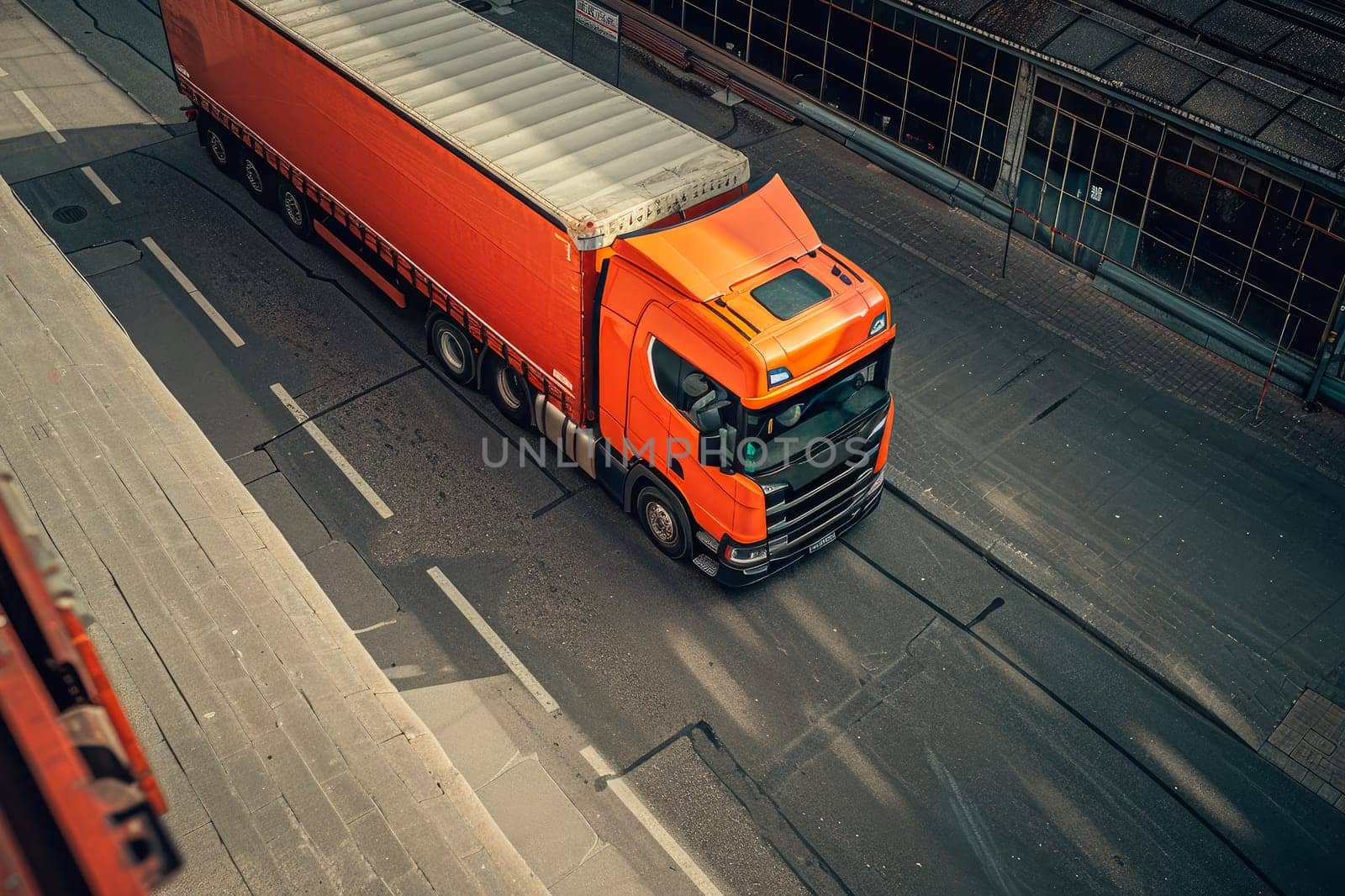 Aerial view an orange truck parked on the side of road, logistic,delivery concept. AI generated