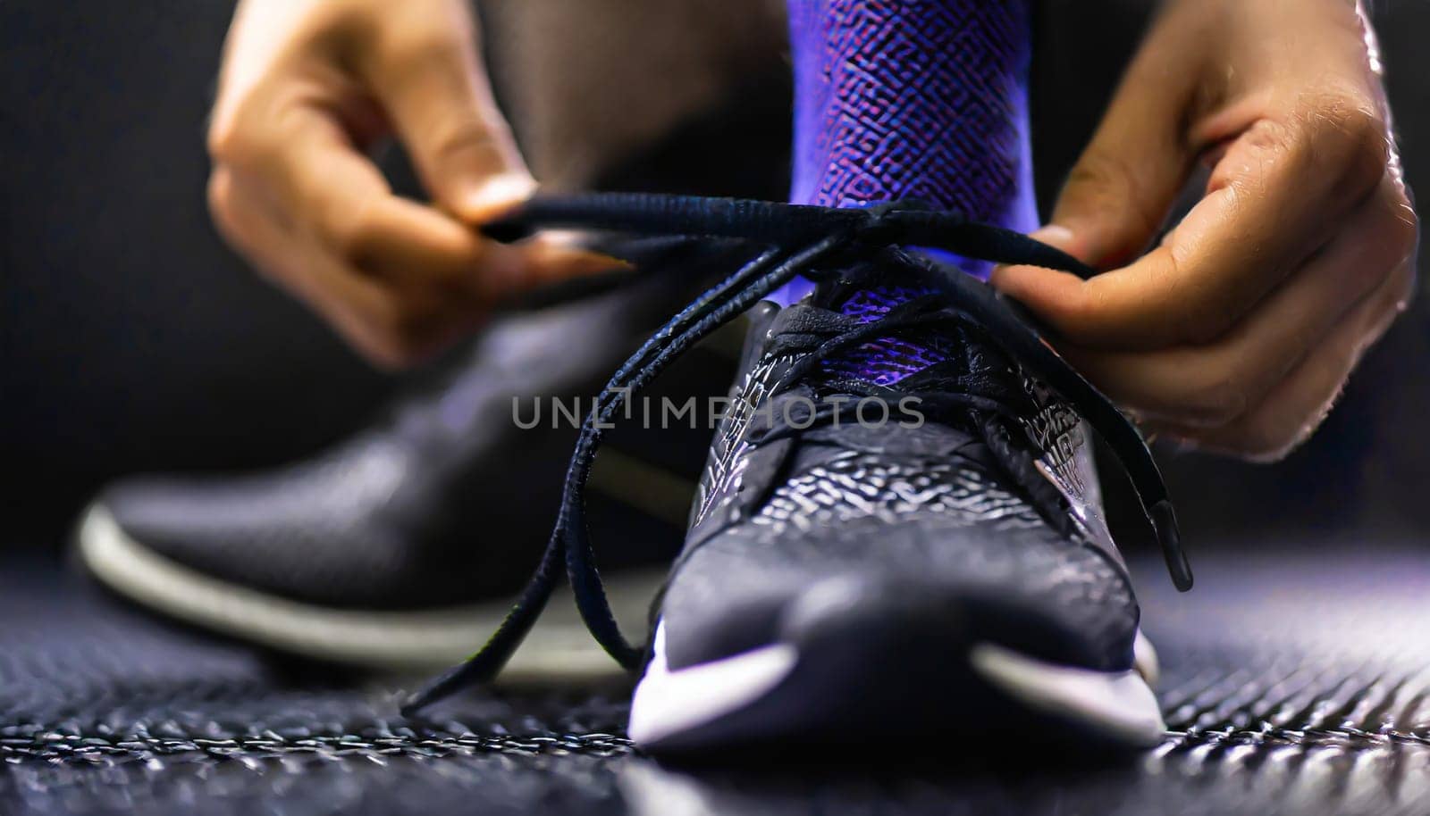 Tying sports shoes