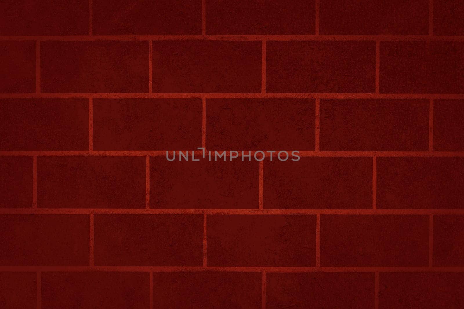 The rough brick wall is red in color. Texture or background