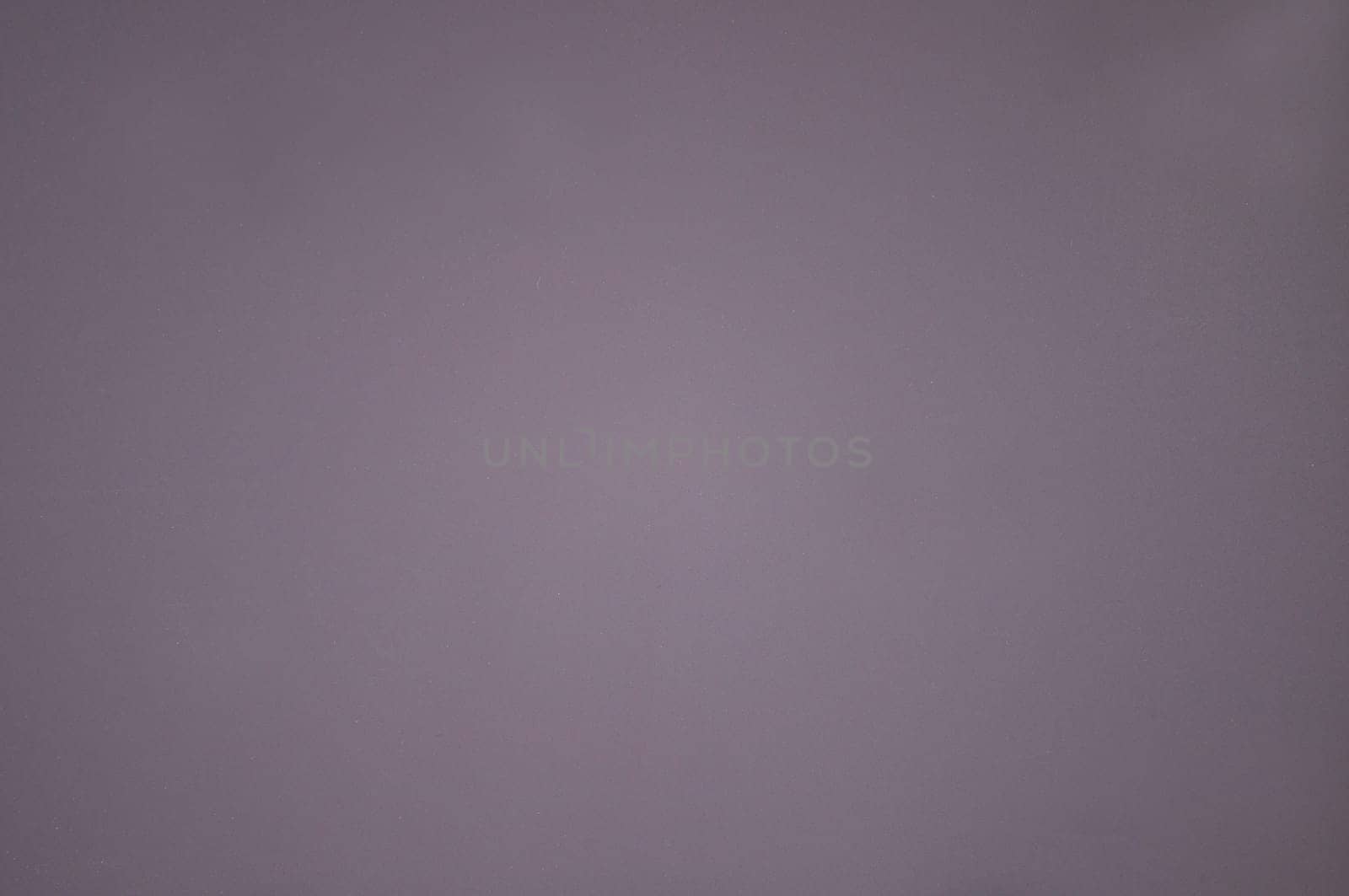 Background image of a lilac rough empty background close-up view from above