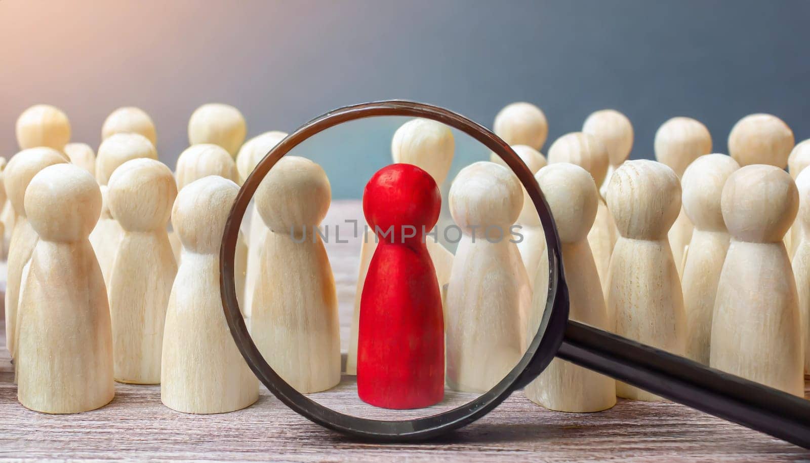 Wooden figures of people are lying on a white background. Social network. Business. The concept of human resources management. Headhunters. Search for people to work. The search for the second half.