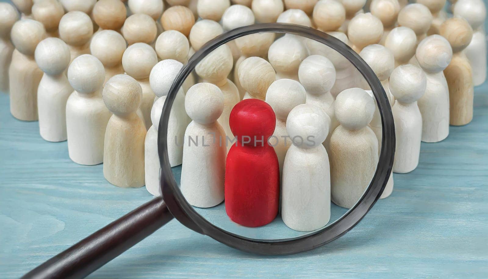Wooden figures of people are lying on a white background. Social network. Business. The concept of human resources management. Headhunters. Search for people to work. The search for the second half.
