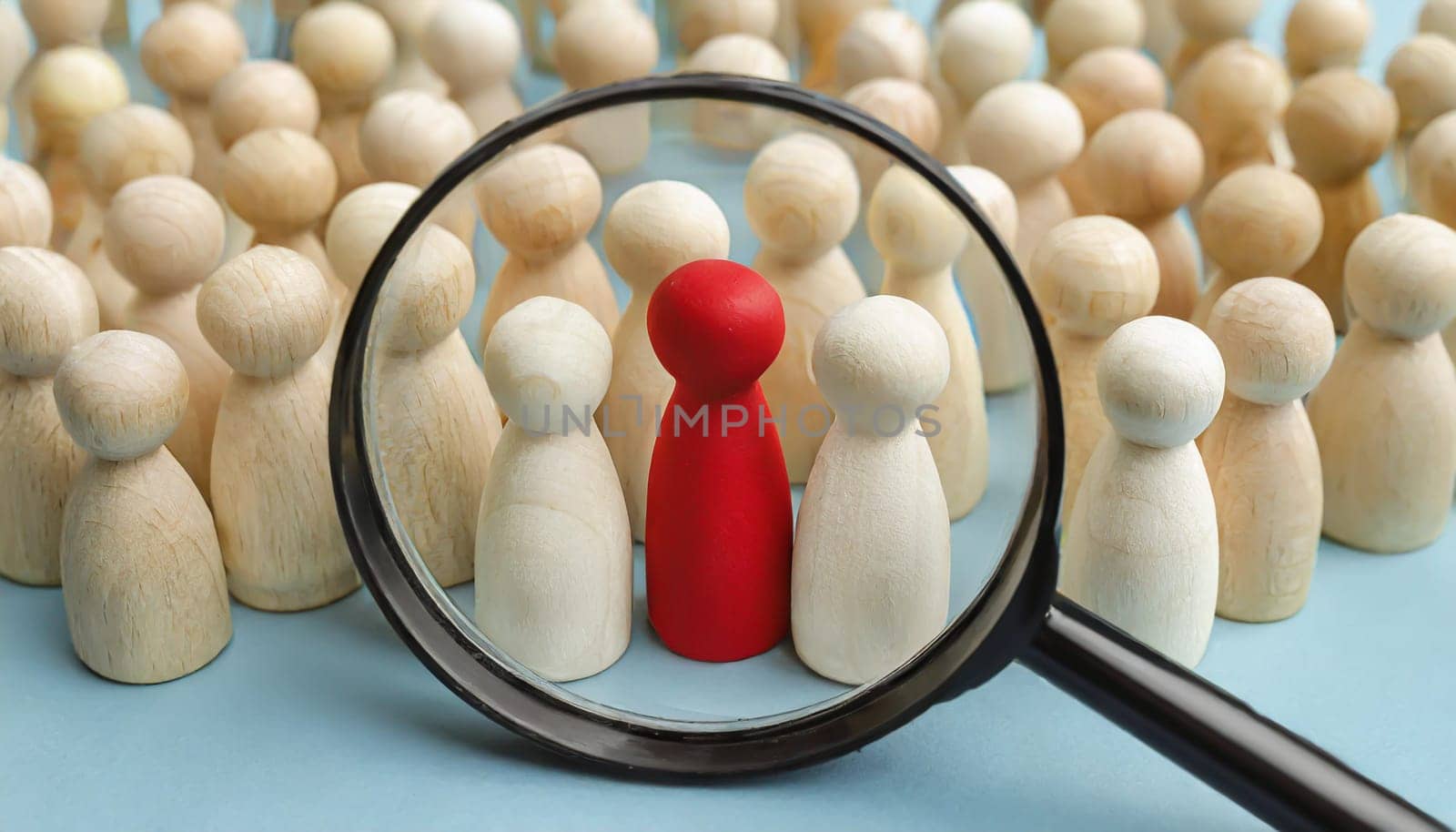 Wooden figures of people are lying on a white background. Social network. Business. The concept of human resources management. Headhunters. Search for people to work. The search for the second half.