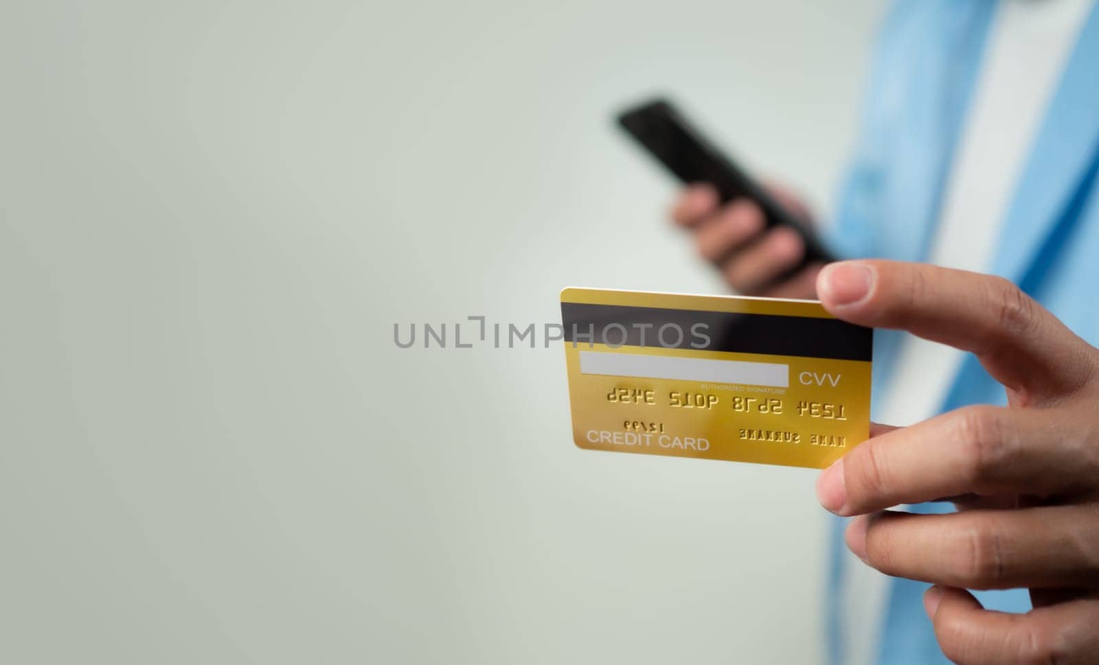 Online payment, Man using mobile smartphone and credit card for online shopping, Digital online payment concept, Technology online banking applications via internet network, financial transaction.