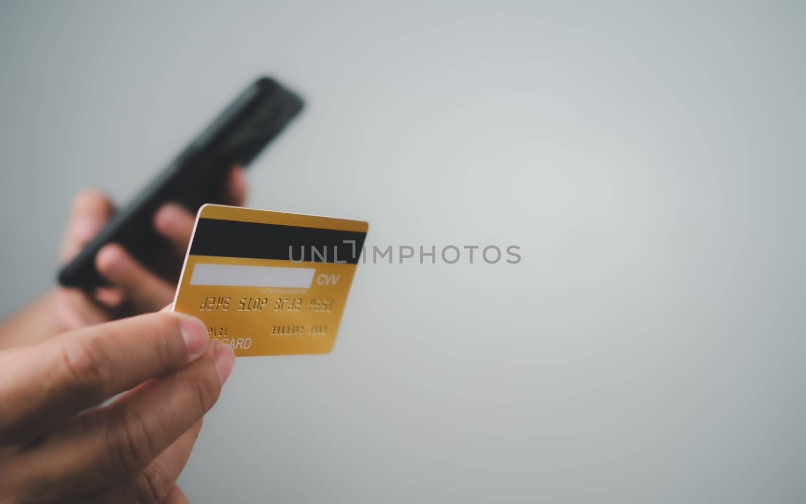 Online payment, Man using mobile smartphone and credit card for online shopping, Digital online payment concept, Technology online banking applications via internet network, financial transaction.