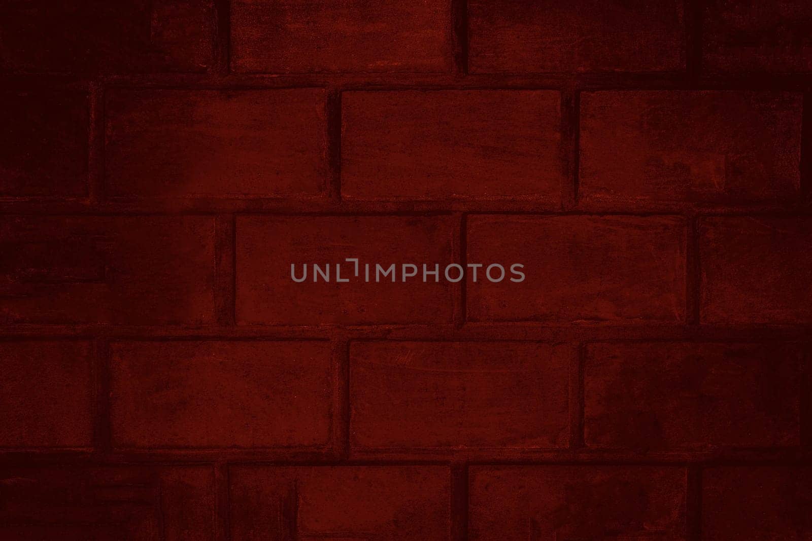 Background texture of a red brick wall with darkened edges and dirty surface close-up