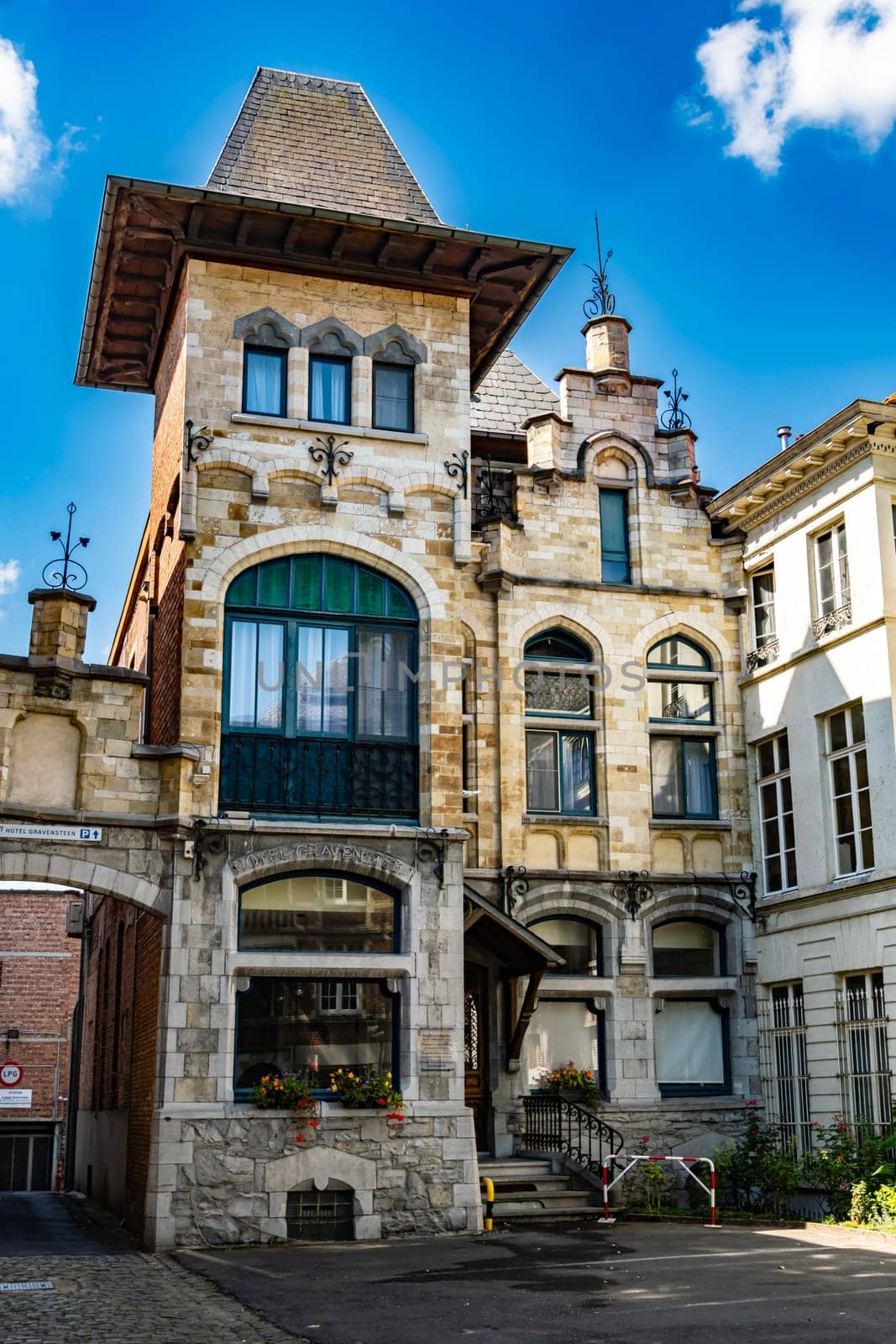 GHENT, BELGIUM - AUG 24, 2022: Architecture of the historic city center of Ghent in the Flemish Region of Belgium