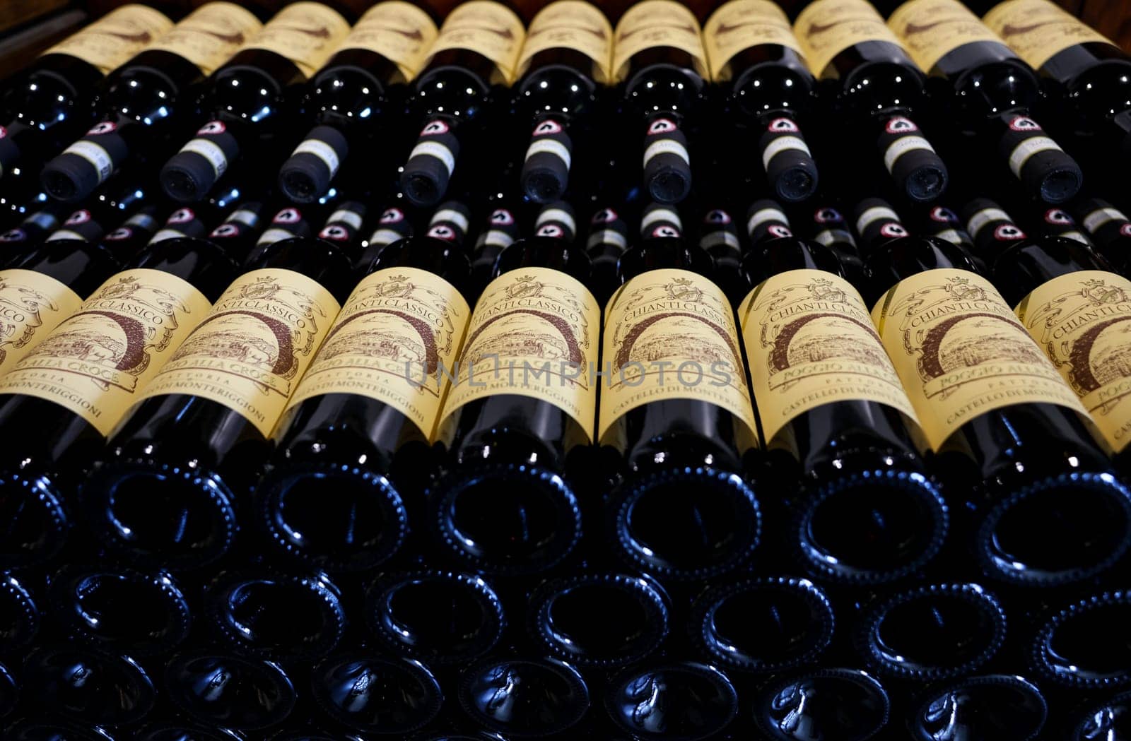 Monteriggioni, Italy - Sept 17, 2022: Neatly arranged bottles of Chianti Classico wine in a wine shop in Monteriggioni near Siena. Italy