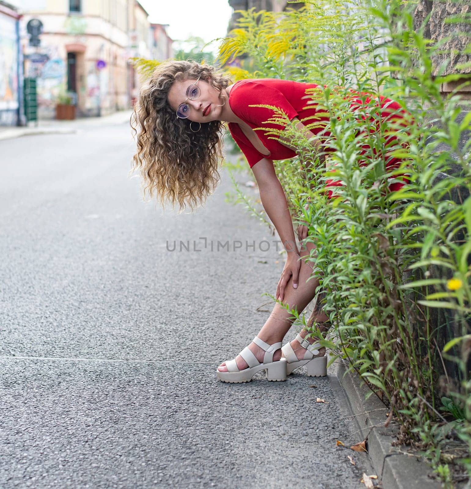 smiling young woman with blowing hairs