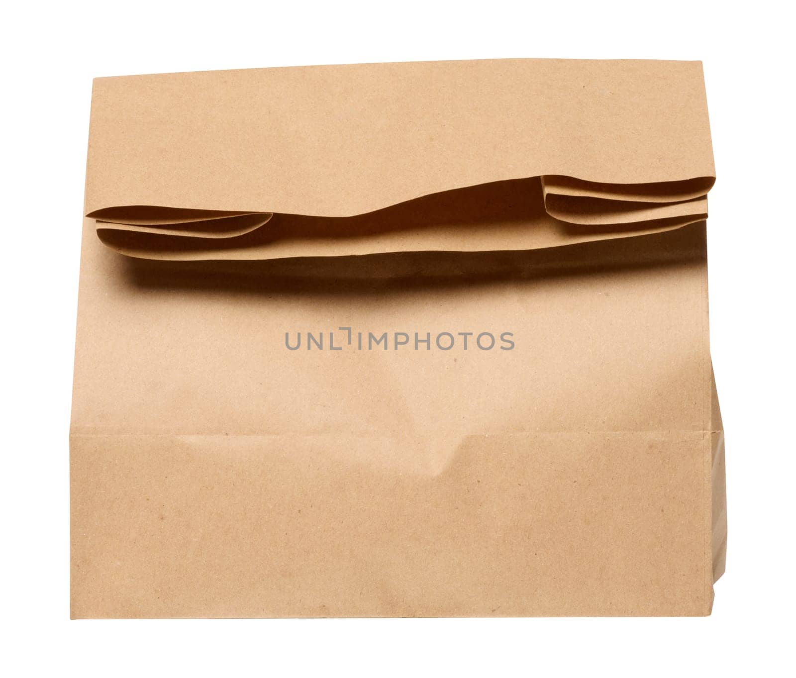 A large empty brown kraft paper bag for packaging products in stores on an isolated background