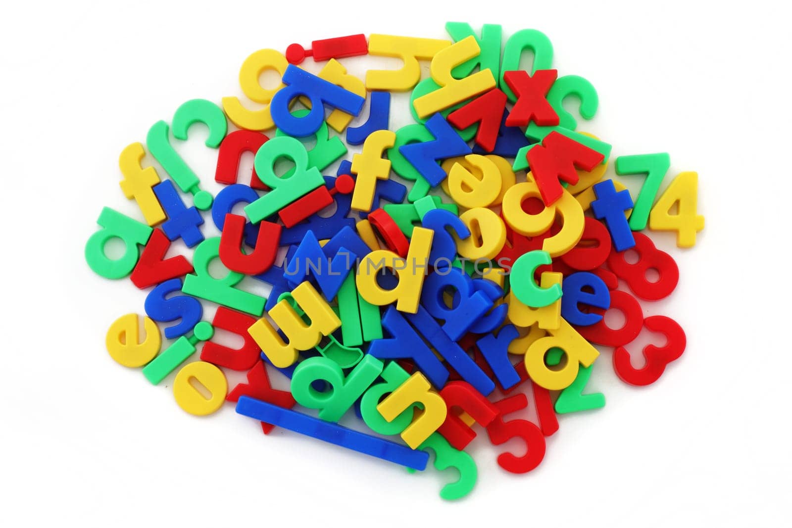 A pile of coloured magnetic letters