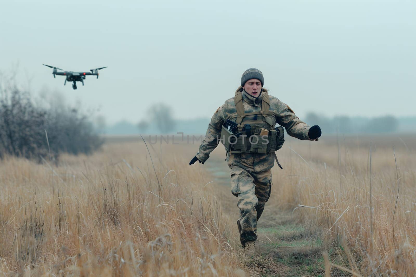 soldier trying to run out of drone at day time autumn non-urban battlefield. Neural network generated image. Not based on any actual scene or pattern.