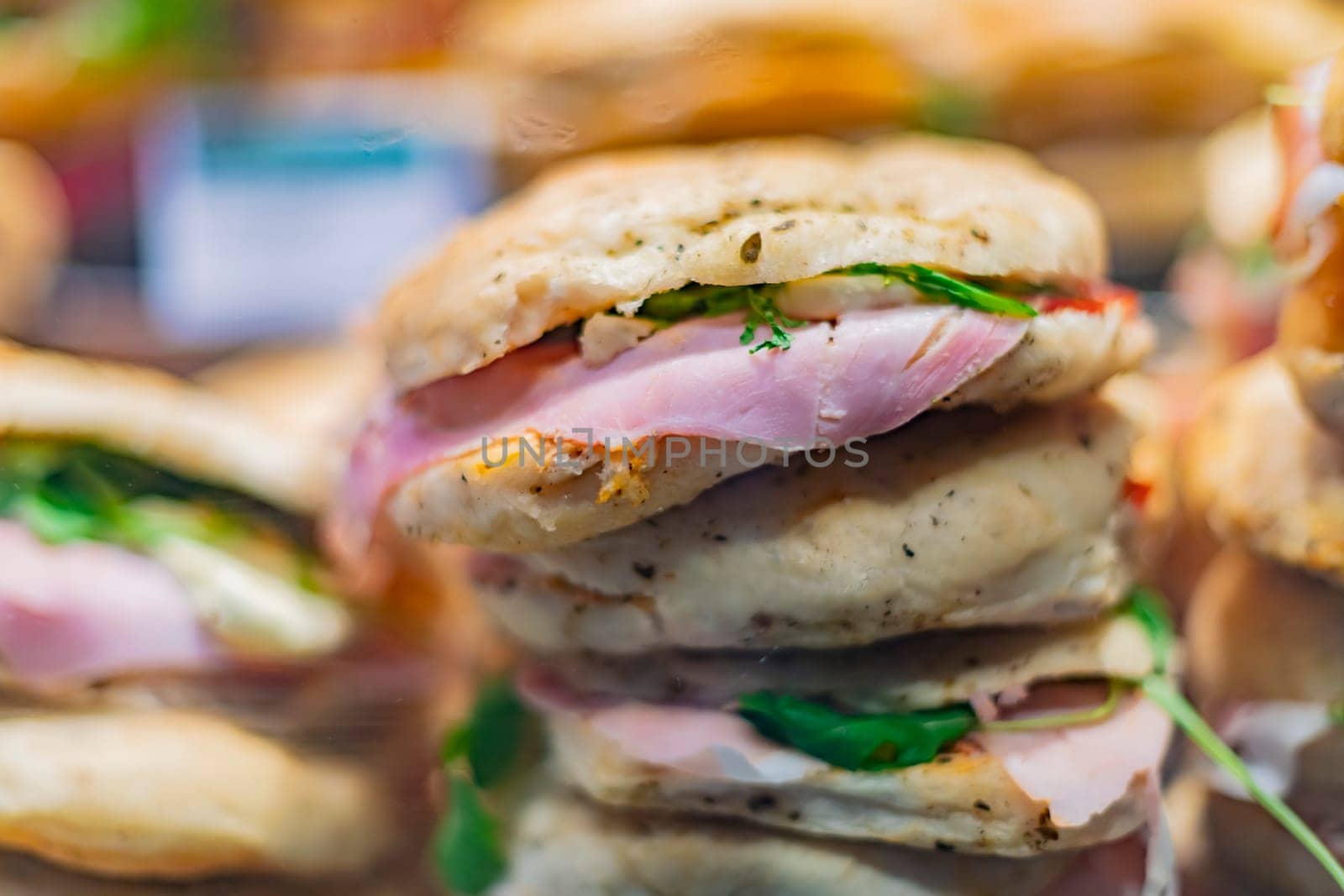 Freshly prepared sandwiches sold in a fast food restaurant.
