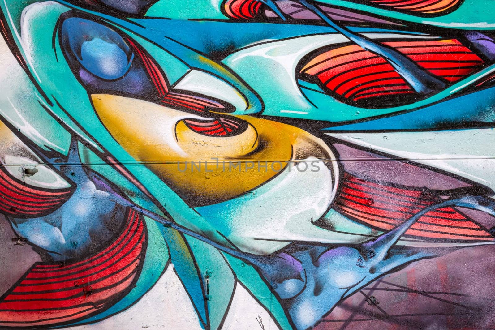 Detail of graffiti painted on public wall, abstract background