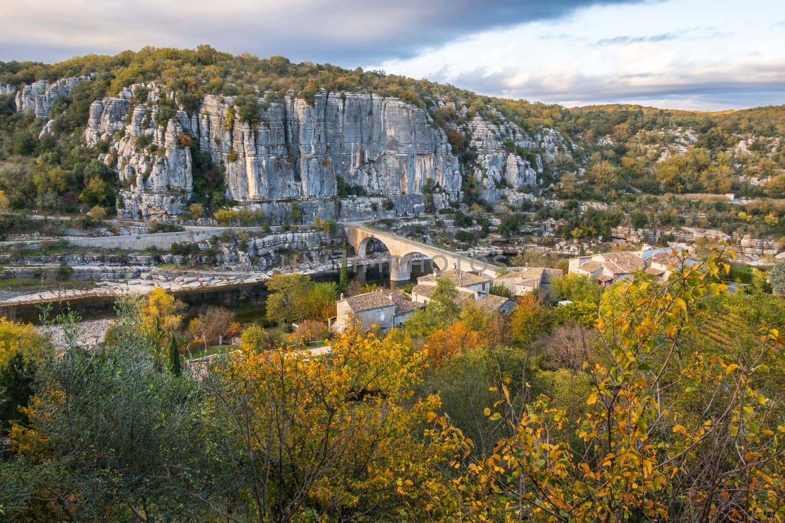 The bridge over the Ardeche river near the old village Balazuc recognized historical heritage, photography taken in France