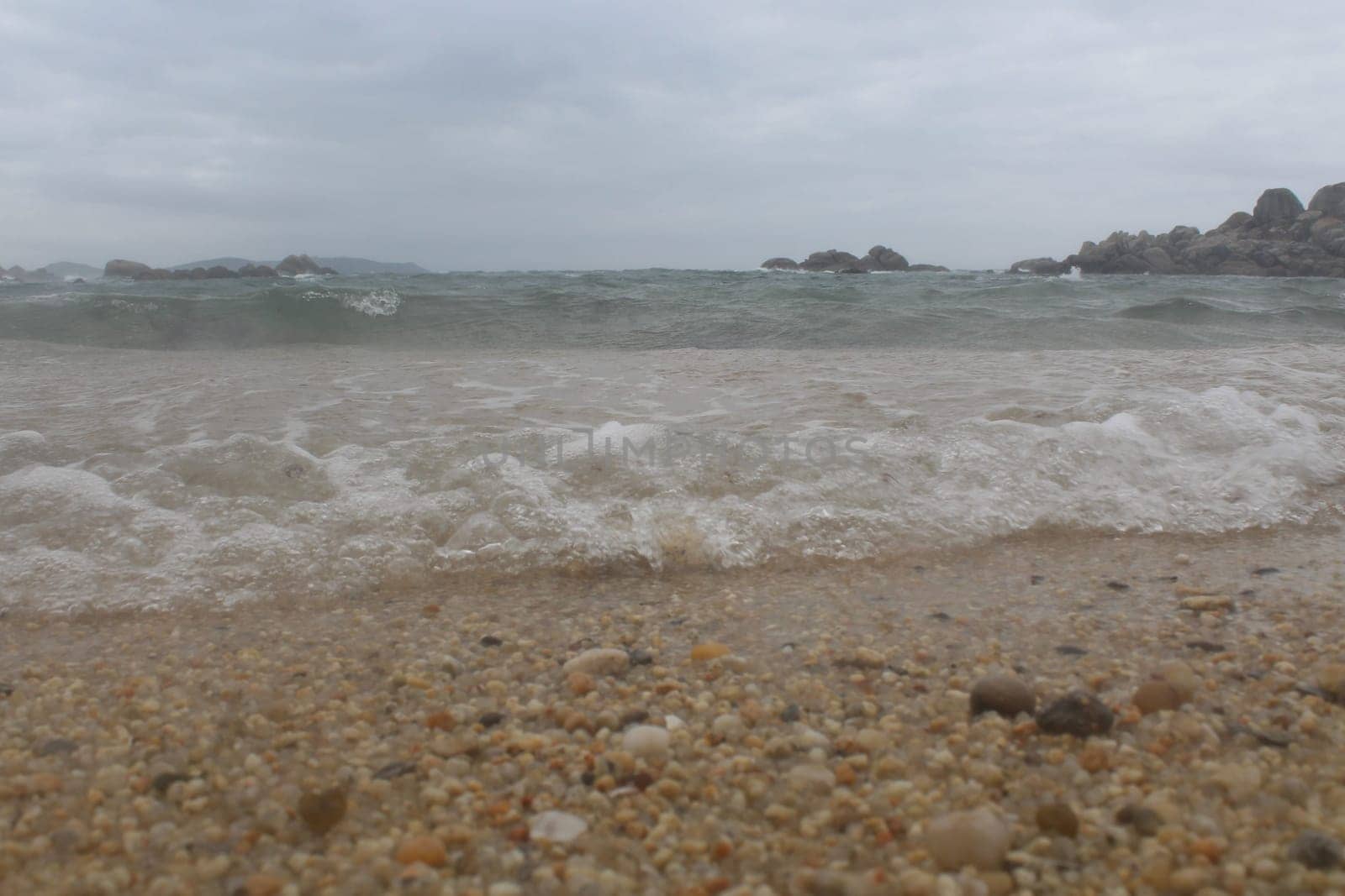 sea currents sand beach stones cliffs waves summer vacation
