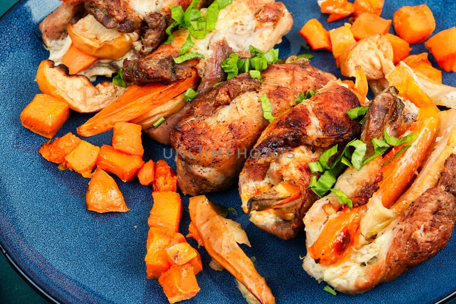 Rolled meat stuffed with apples and sweet potatoes. Space for text.