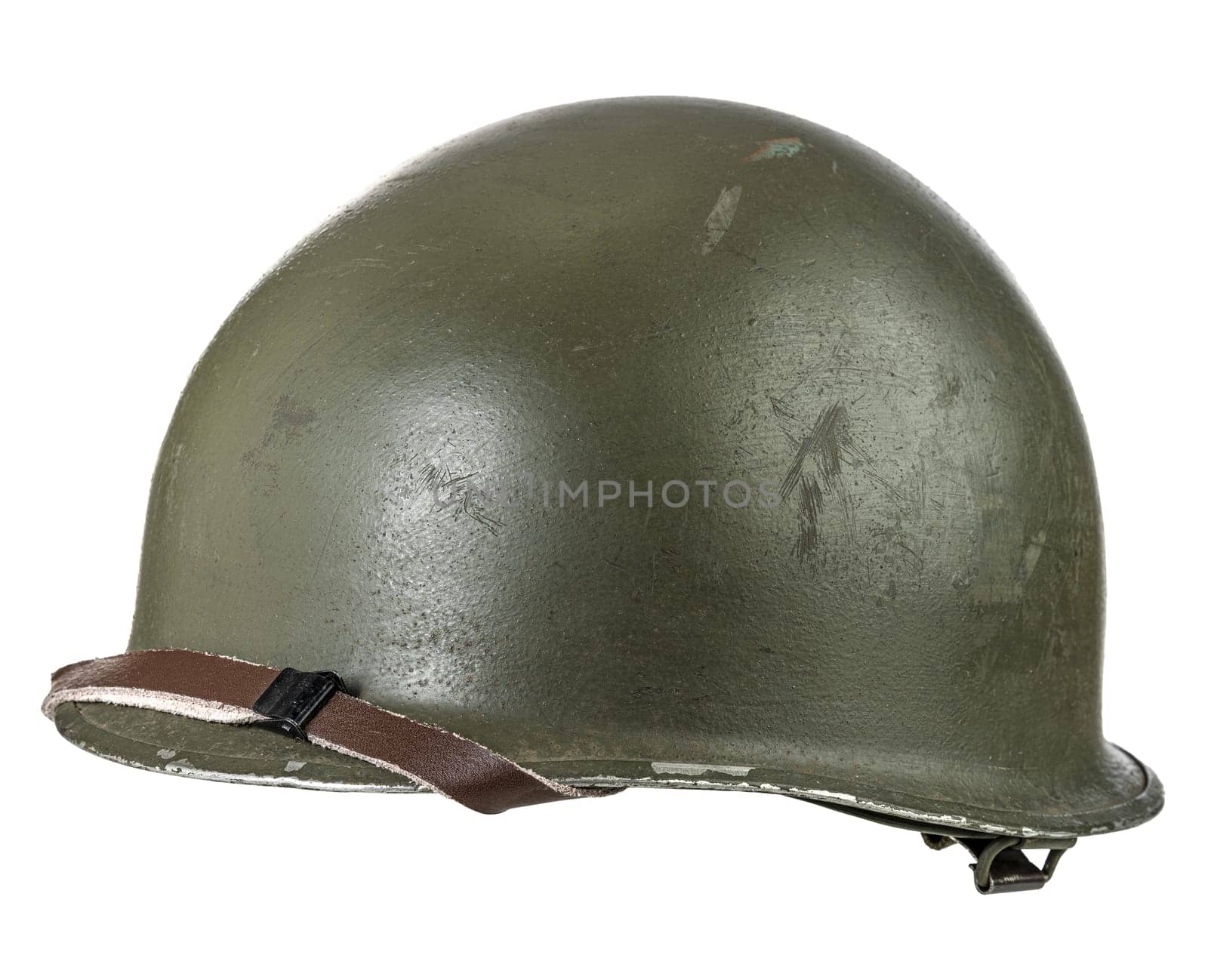 Close-up of an old army helmet, indicative of past military history, isolated on a white backdrop