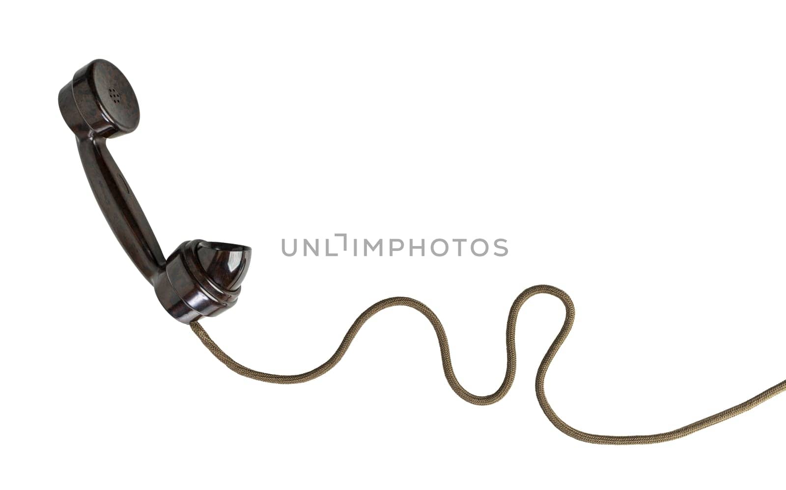 Classic black telephone receiver with a coiled cord isolated on white background