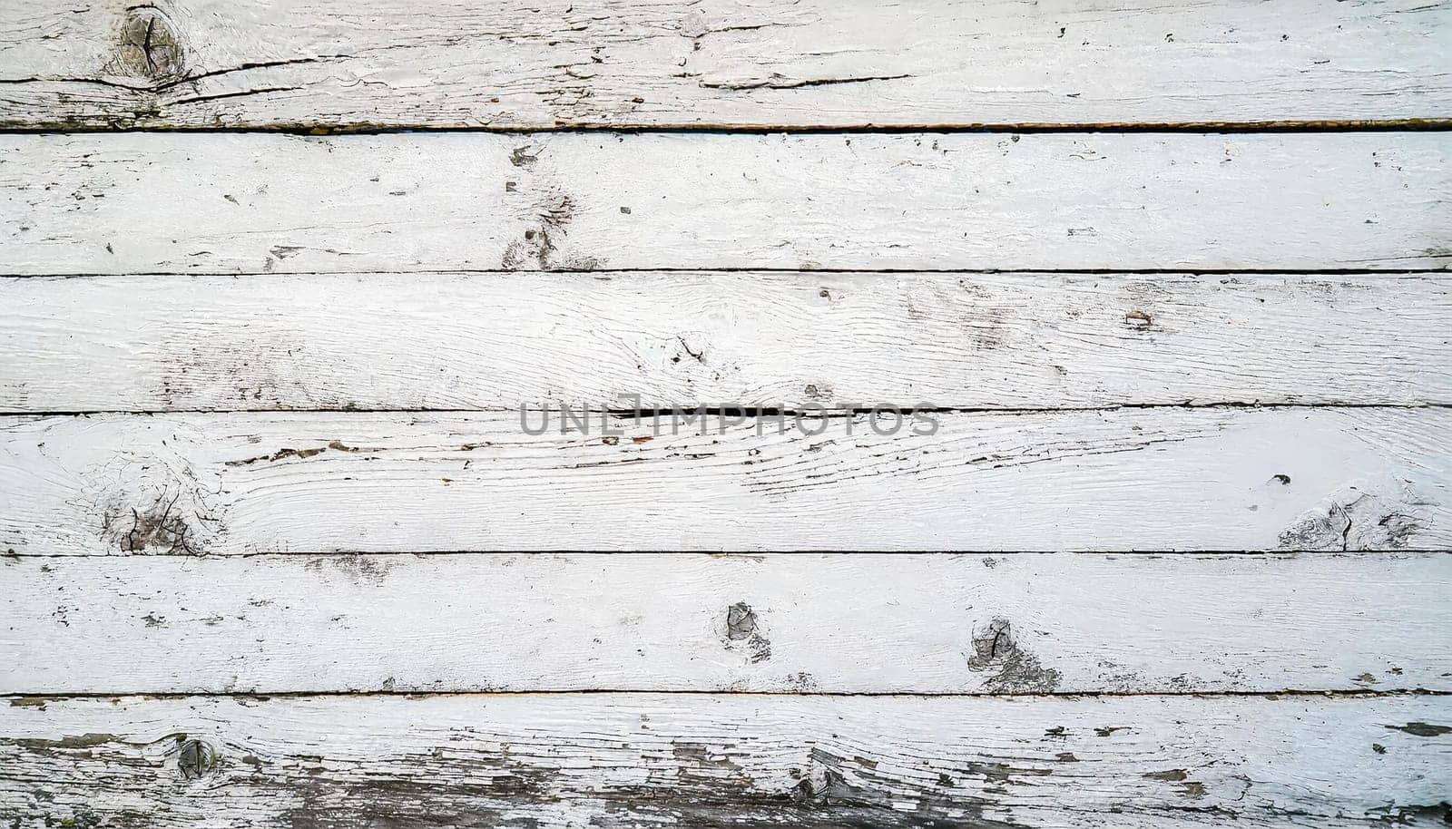 Old wooden background painted with white paint. White wood flooring background abstract vintage texture . Wooden texture design for backgrounds