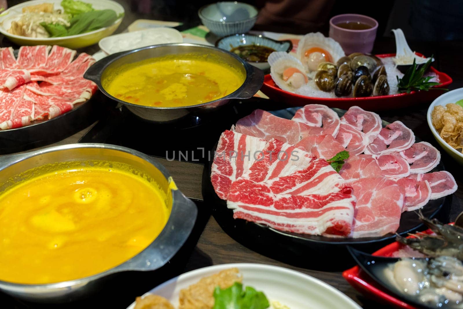 Delicious hotpot with fresh beef and vegetable in restaurant