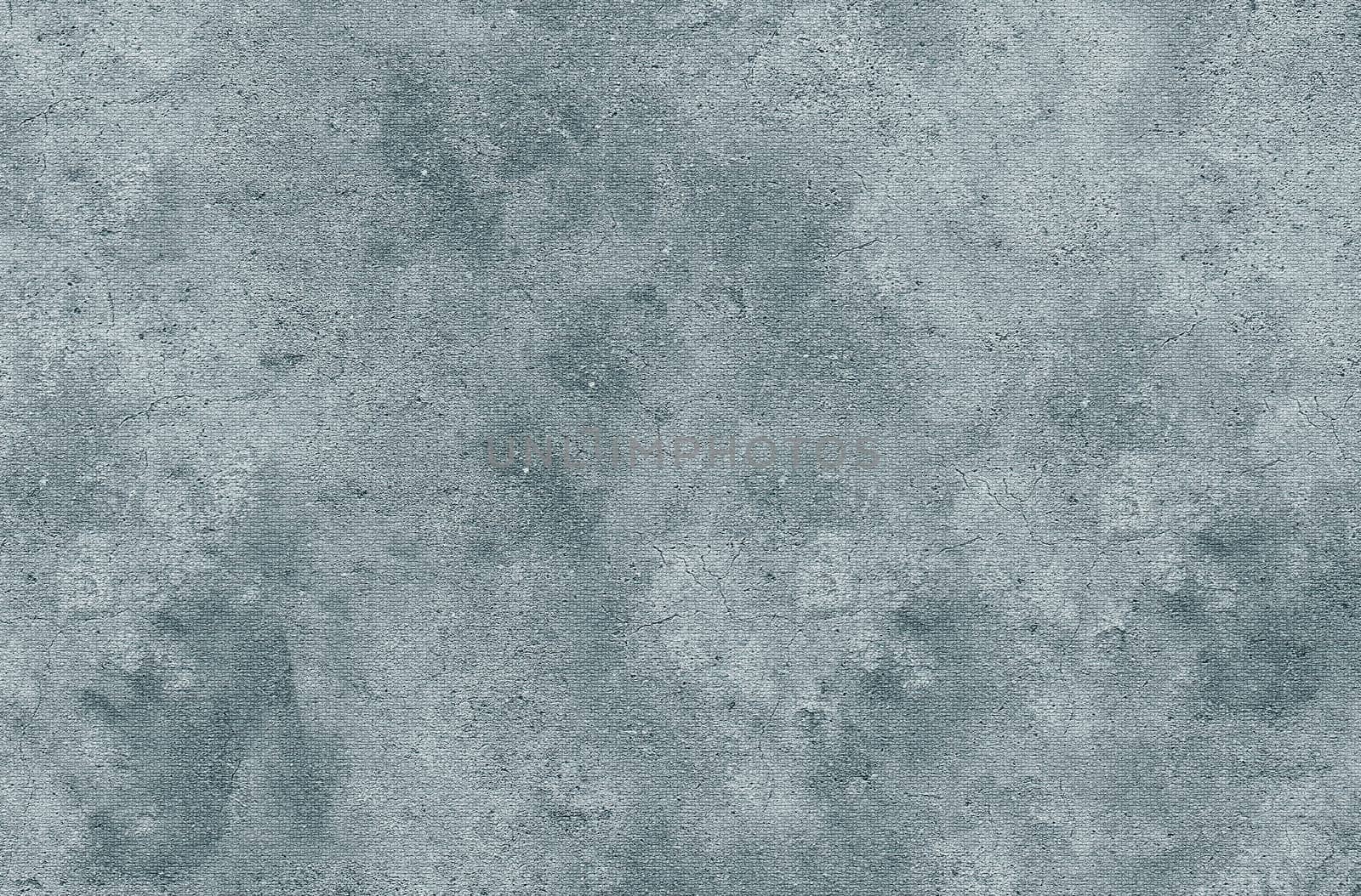 The texture of a gray old rough wall with spots cracks and irregularities on the surface in close-up