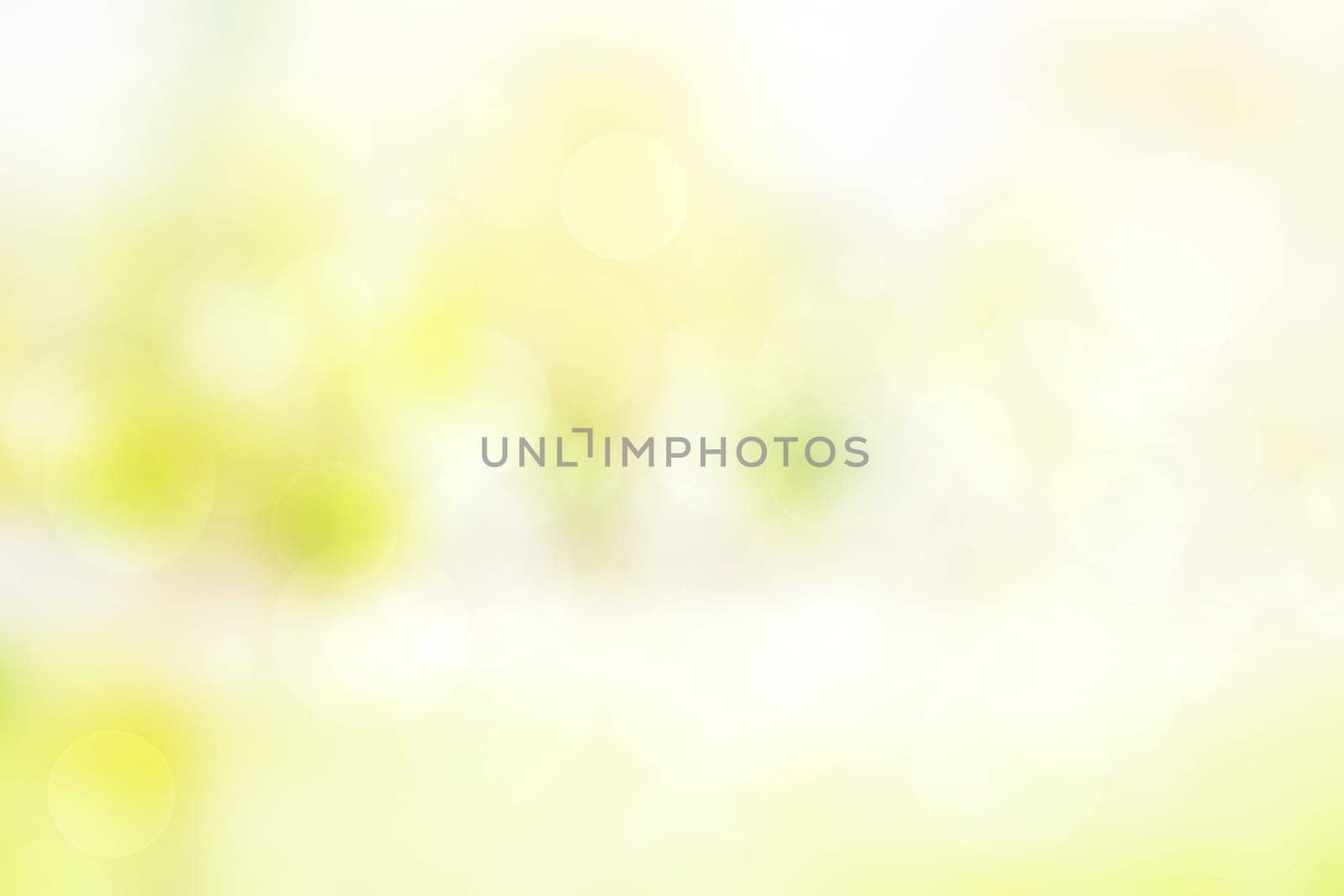 Abstract blurred fresh vivid spring summer light delicate pastel yellow white bokeh background texture with bright circular soft color lights. Beautiful backdrop illustration.