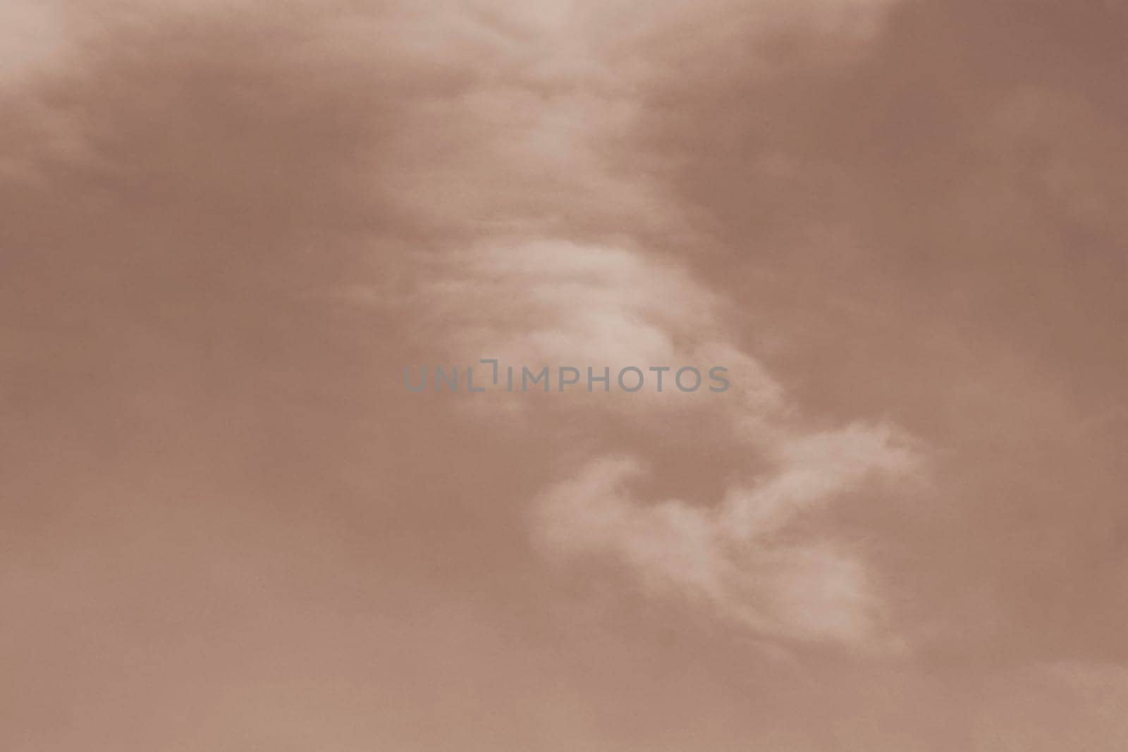 A gentle soft cloudscape in Peach Fuzz