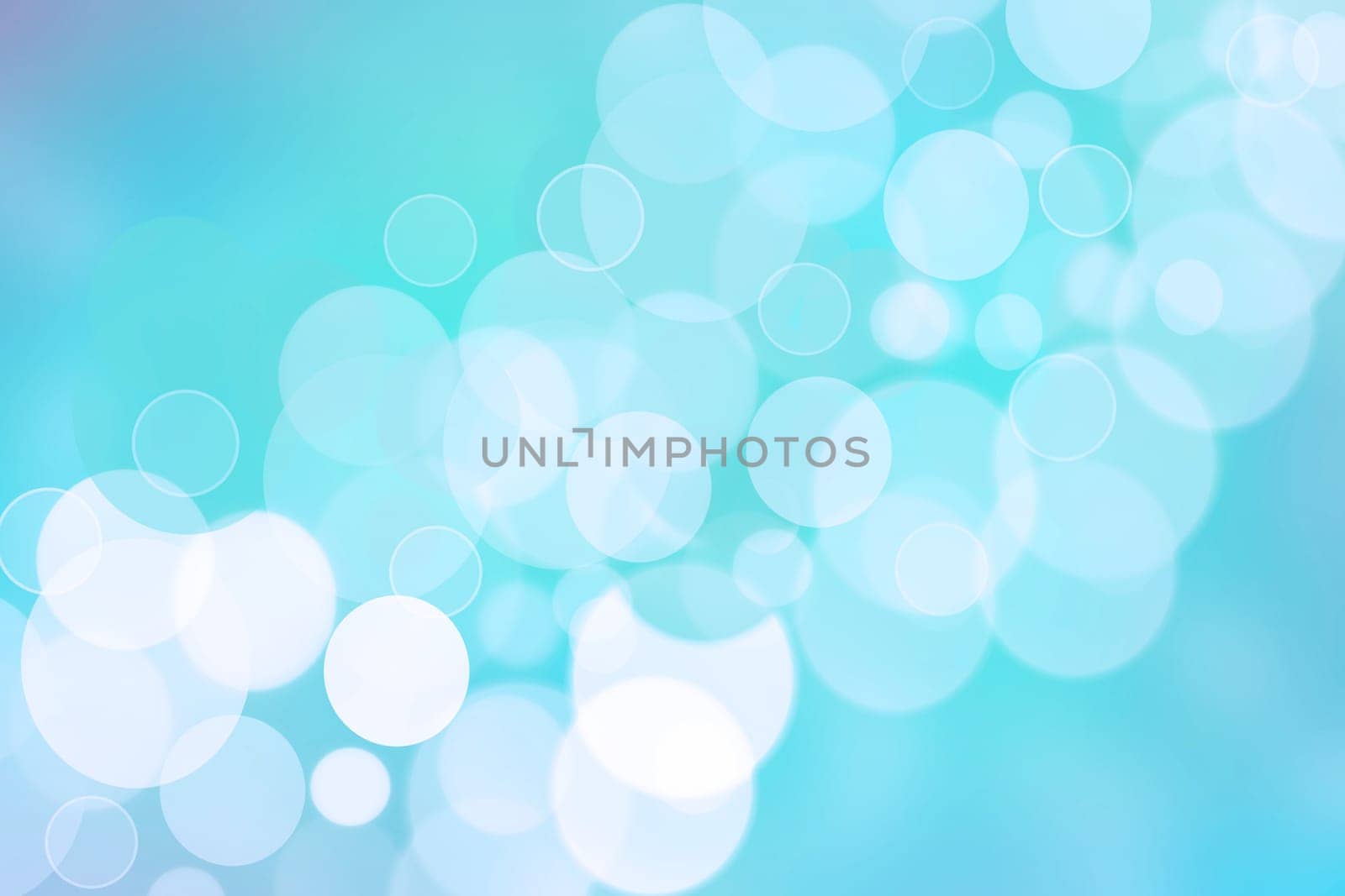 Abstract blurred fresh vivid spring summer light delicate pastel blue turquoise white bokeh background texture with bright circular soft color lights. Card concept. Beautiful backdrop illustration.