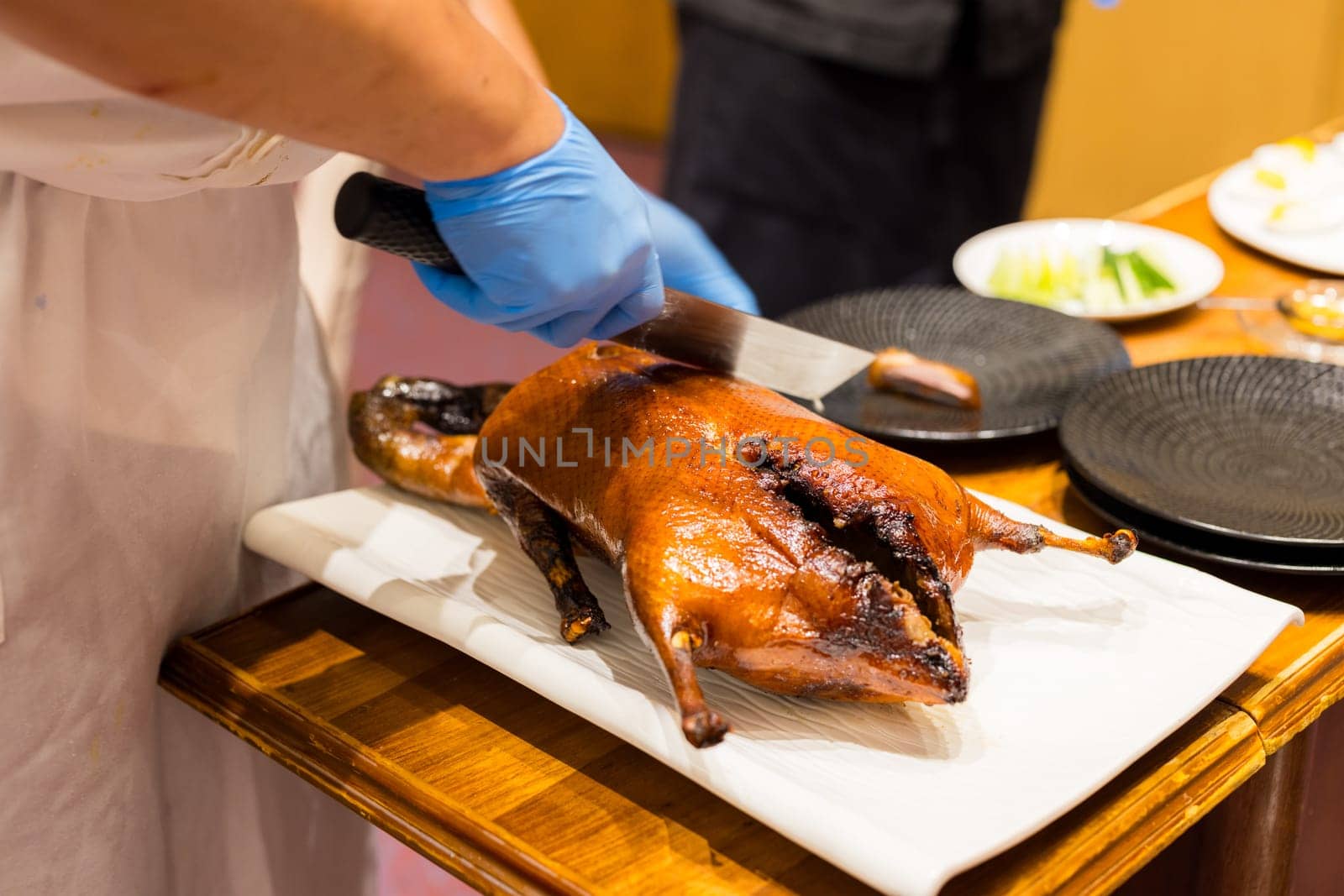 Chef prepare the peking duck in restaurant