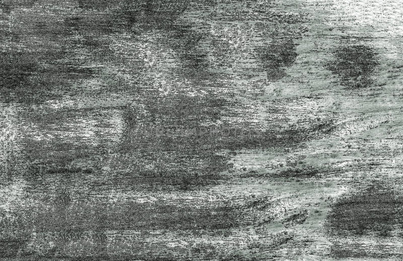 Background grunge texture with spots and raised particles on the surface in close-up