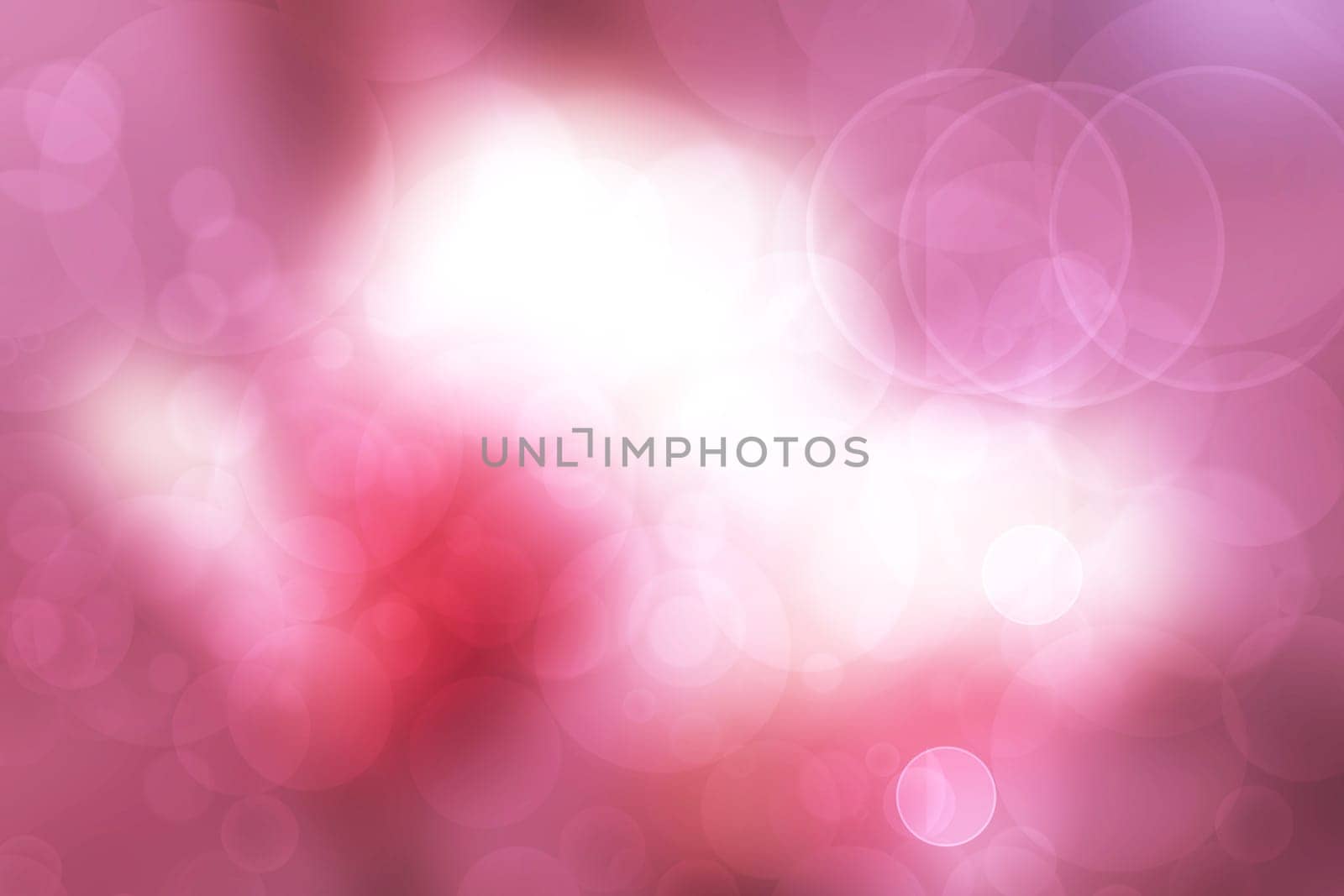 A festive abstract gradient orange pink white background texture with glitter defocused sparkle bokeh circles . Card concept for Happy New Year, party invitation, valentine or other holidays.