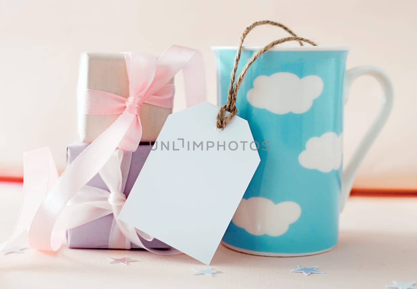 Birthday card with empty copy space tag. Father's, mother's day greetings. Gift boxes and mug holiday design.