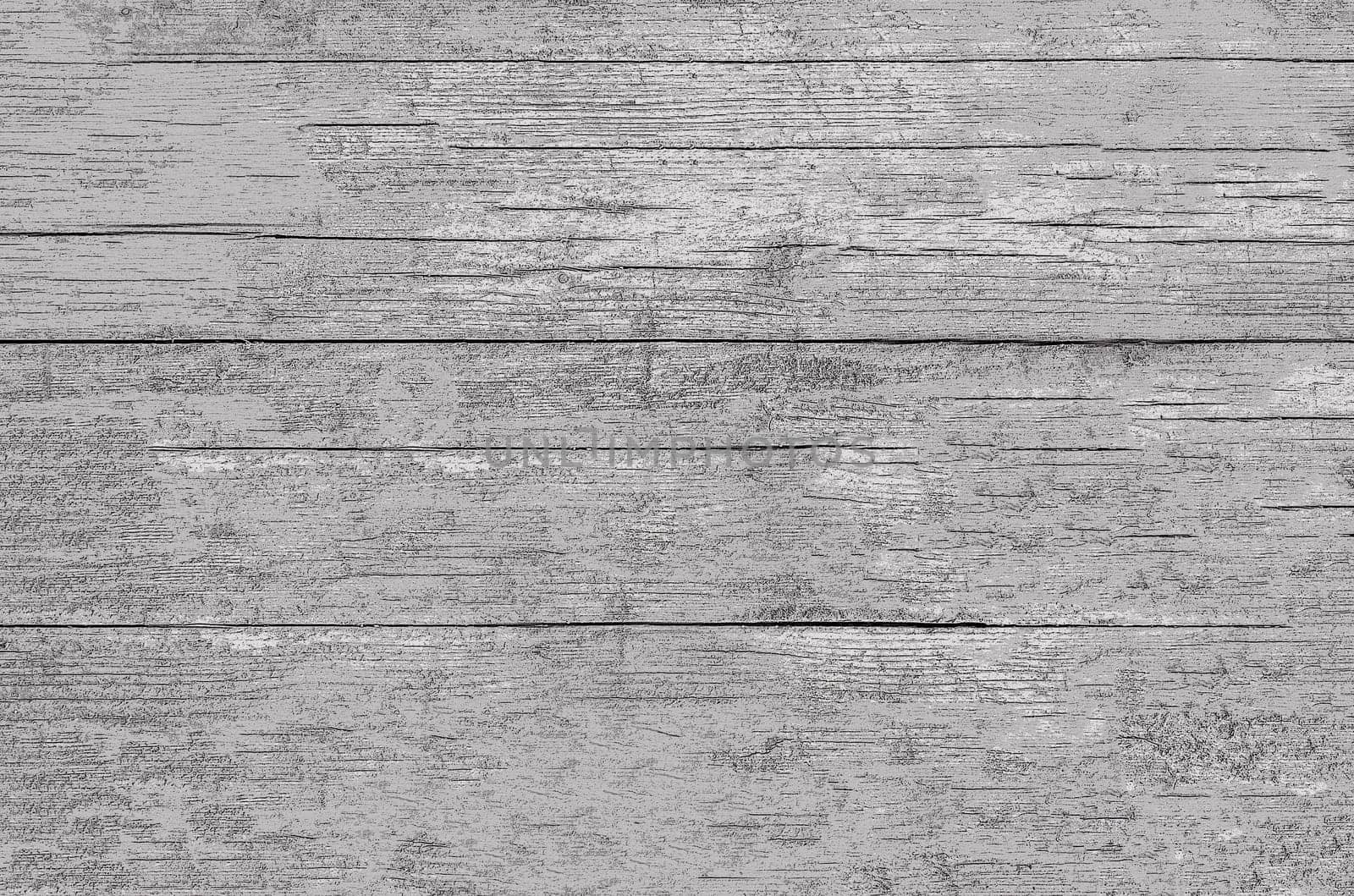 The wall surface imitating old rough boards with a natural pattern on the surface