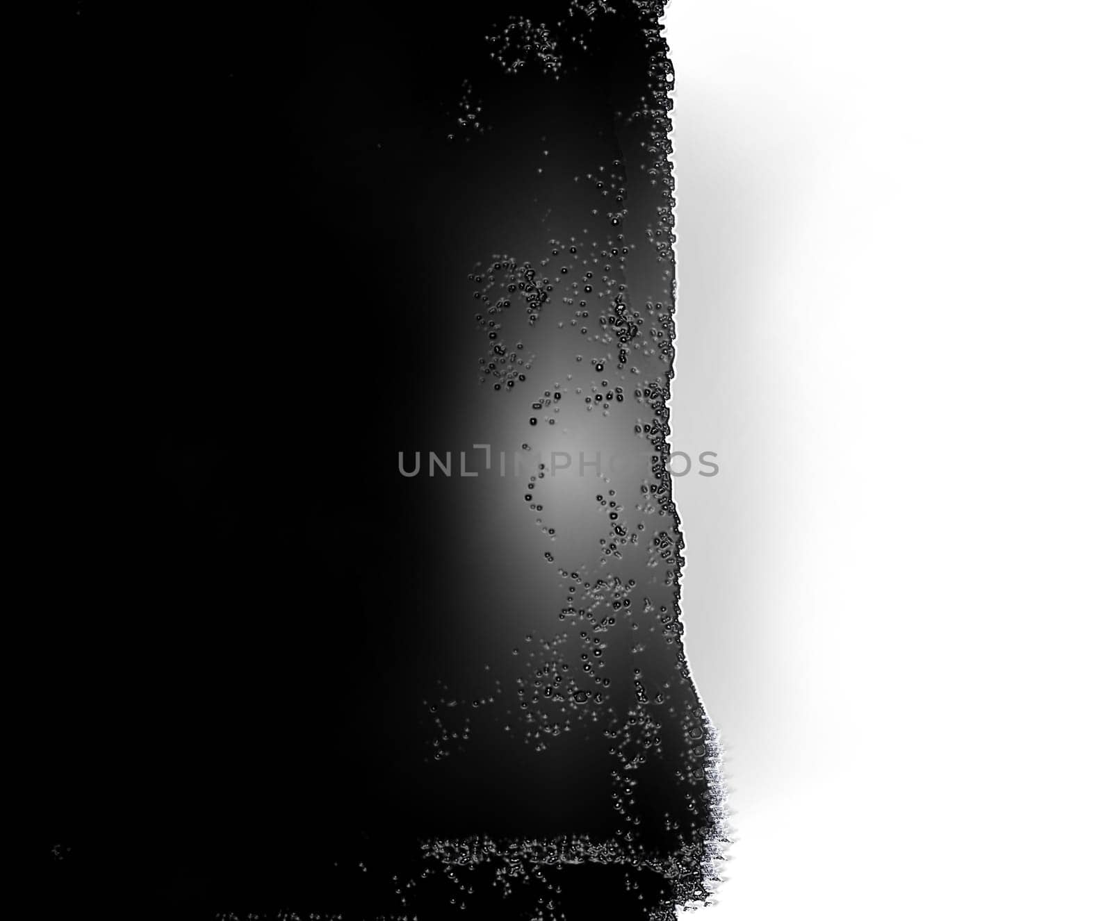 Background texture black and white split surface with uneven edges close-up