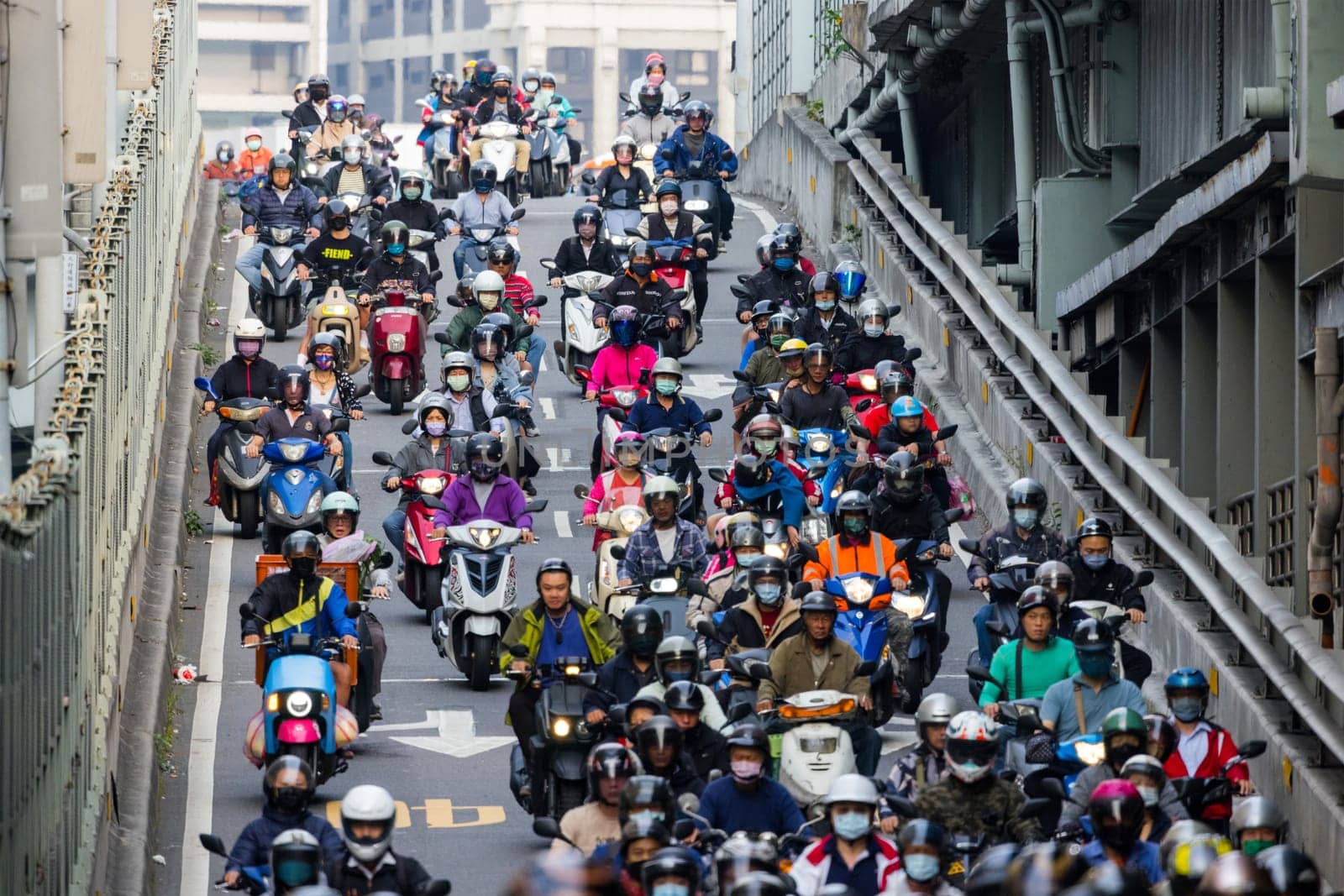 Taipei, Taiwan 19 April 2023: Crowd of motorcycles over the Taipei bridge