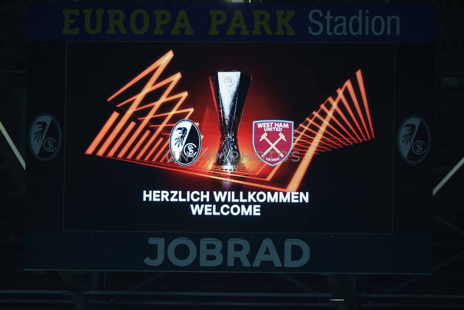 Welcome,welcome is written on the big scoreboard before the match of the Football Europa League - Round of 16: SC Freiburg vs West Ham United