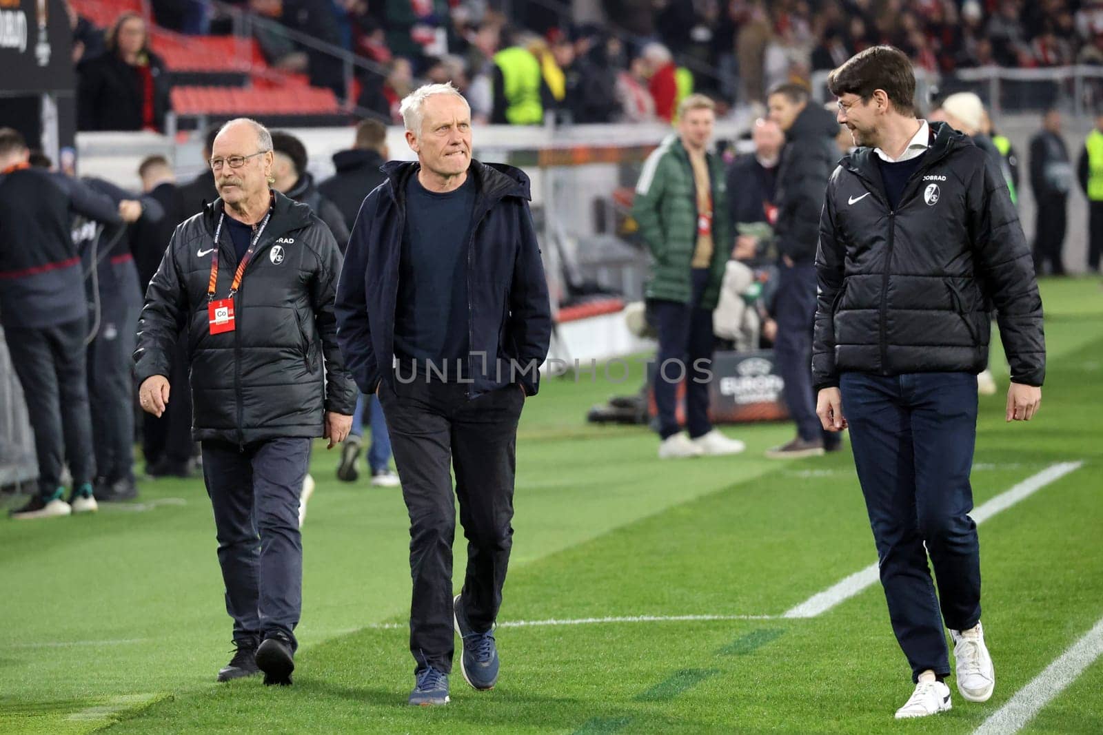 Coach Christian Streich (SC Freiburg) on his way to a TV interview ahead of the Europa League match - Round of 16: SC Freiburg vs West Ham United