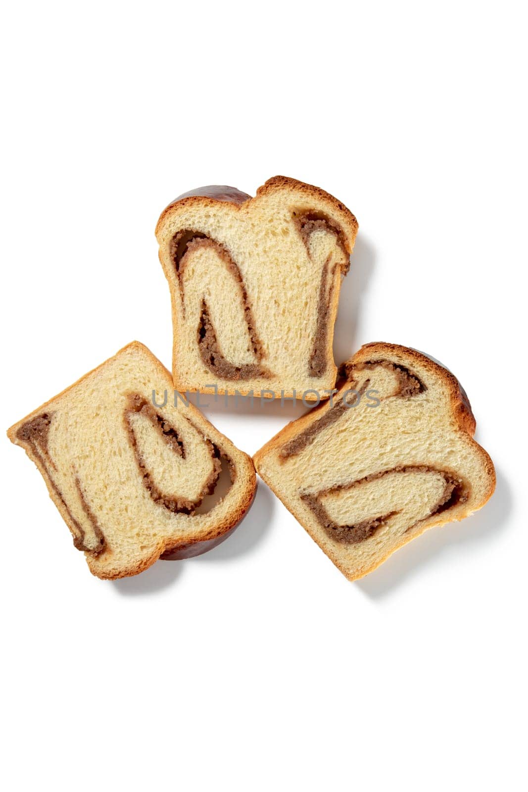 Savor the homely delight of three walnut bread cake slices. Rich, nutty flavor awaits in every bite.