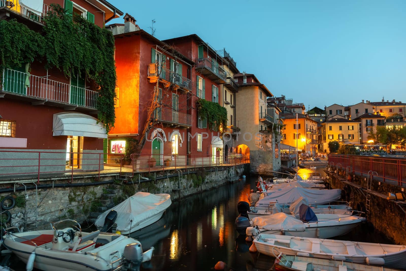 Bay with boats in the town of Varenna in Italy on Lake Como