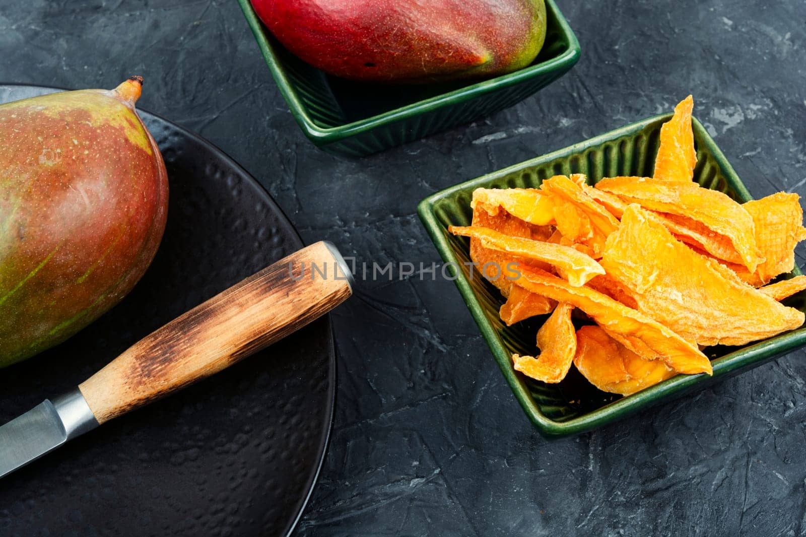 Dried and fresh mango fruit. Superfood, vegan or vegetarian.