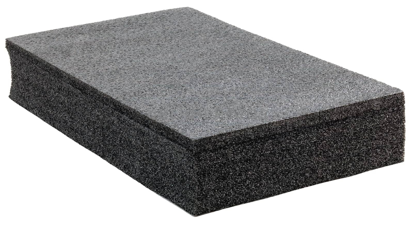 Black high-impact closed-cell polyethylene black foam brick isolated on white background. Specifically designed packing material.