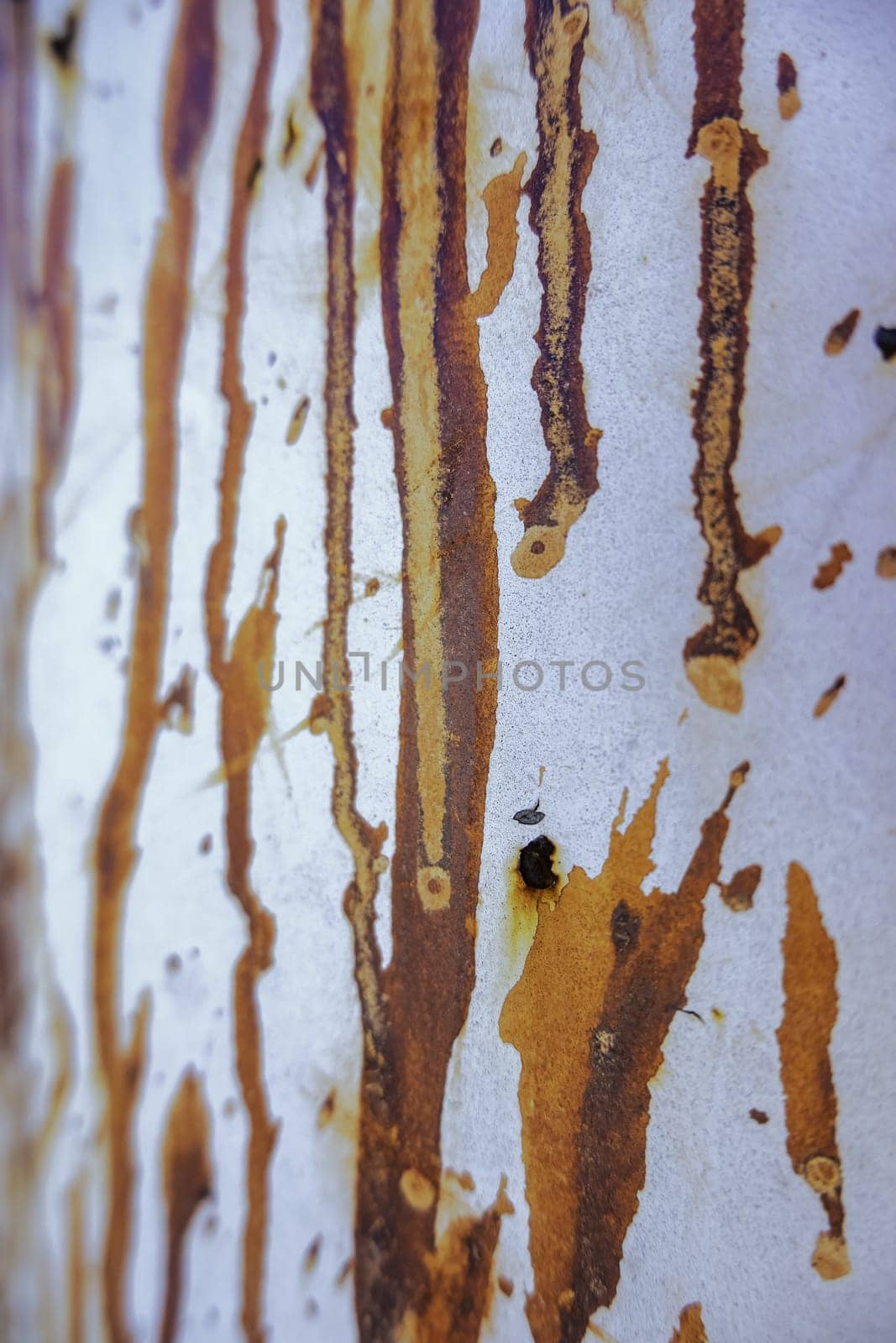 Detail of old metal wall damaged by time, dirt