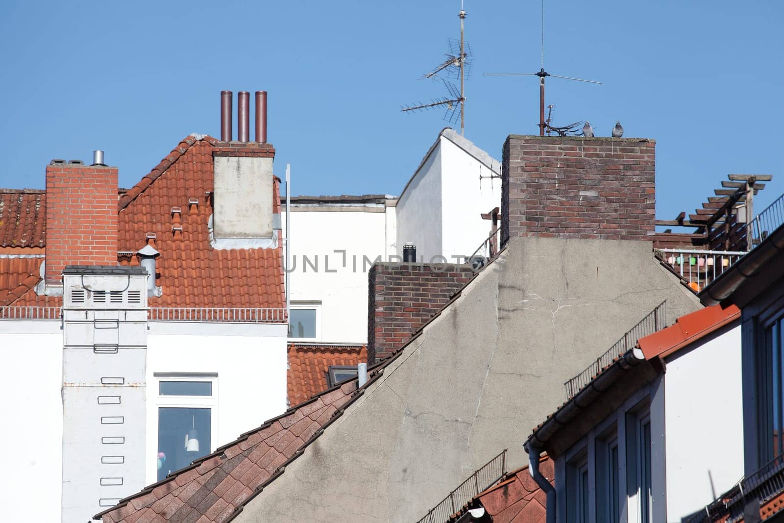 Residential building with roofs and chimneys, Bremen, Germany