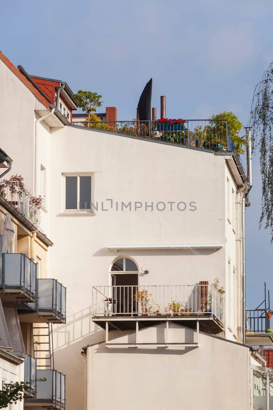 Old, white residential building, rear view with balcony, Bremen, Germany