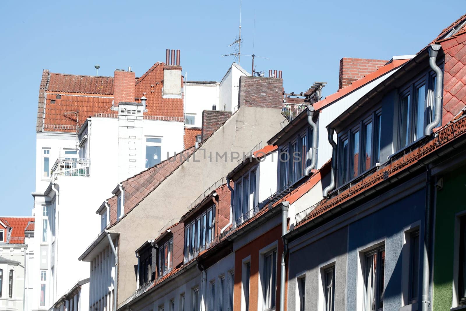 Residential building with roofs and chimneys, Bremen, Germany