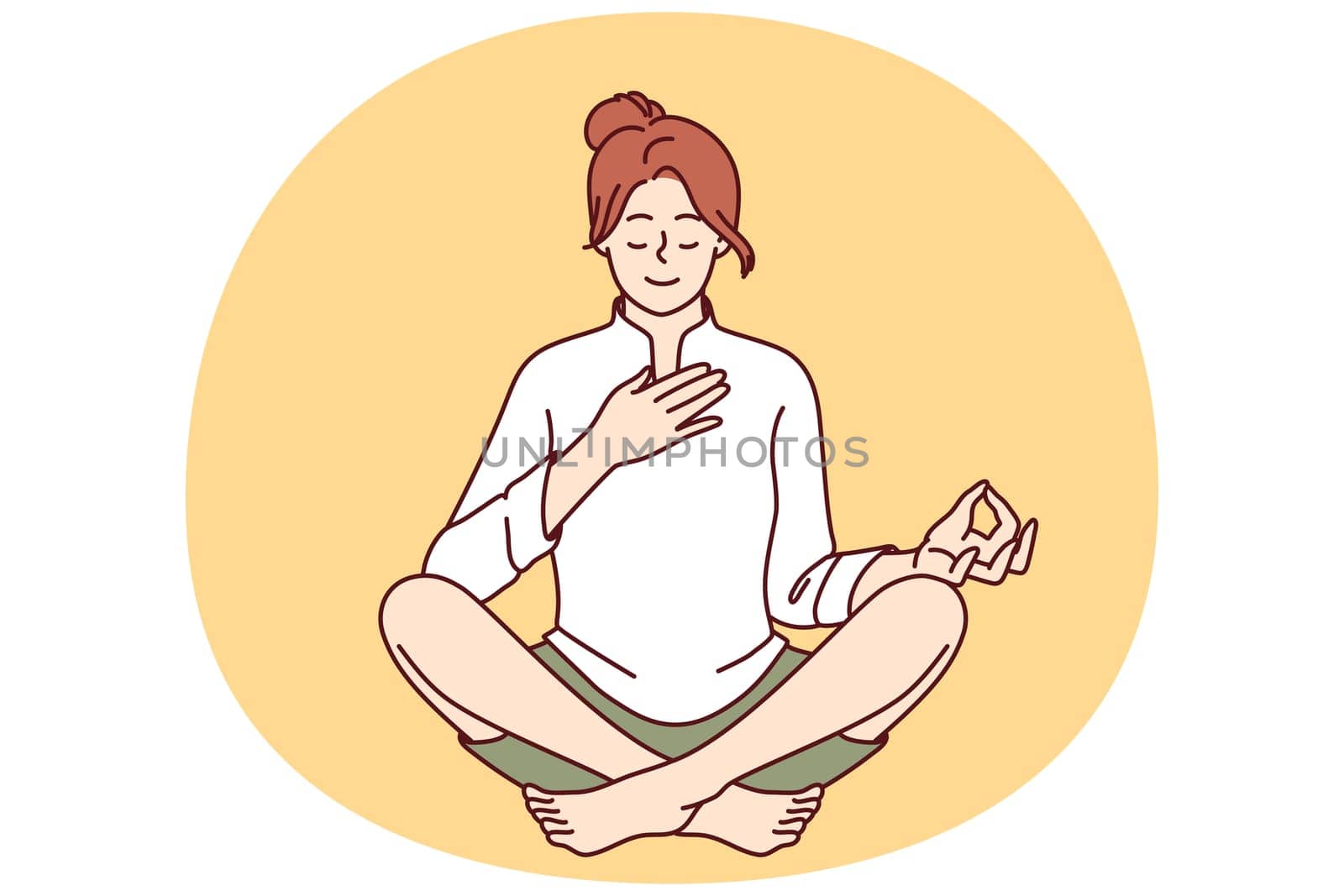 Woman meditates with hand on heart and wishes to heal herself through yoga and Buddhist spiritual practices. Girl sitting in lotus position takes care of heart chakra and relaxes during yoga