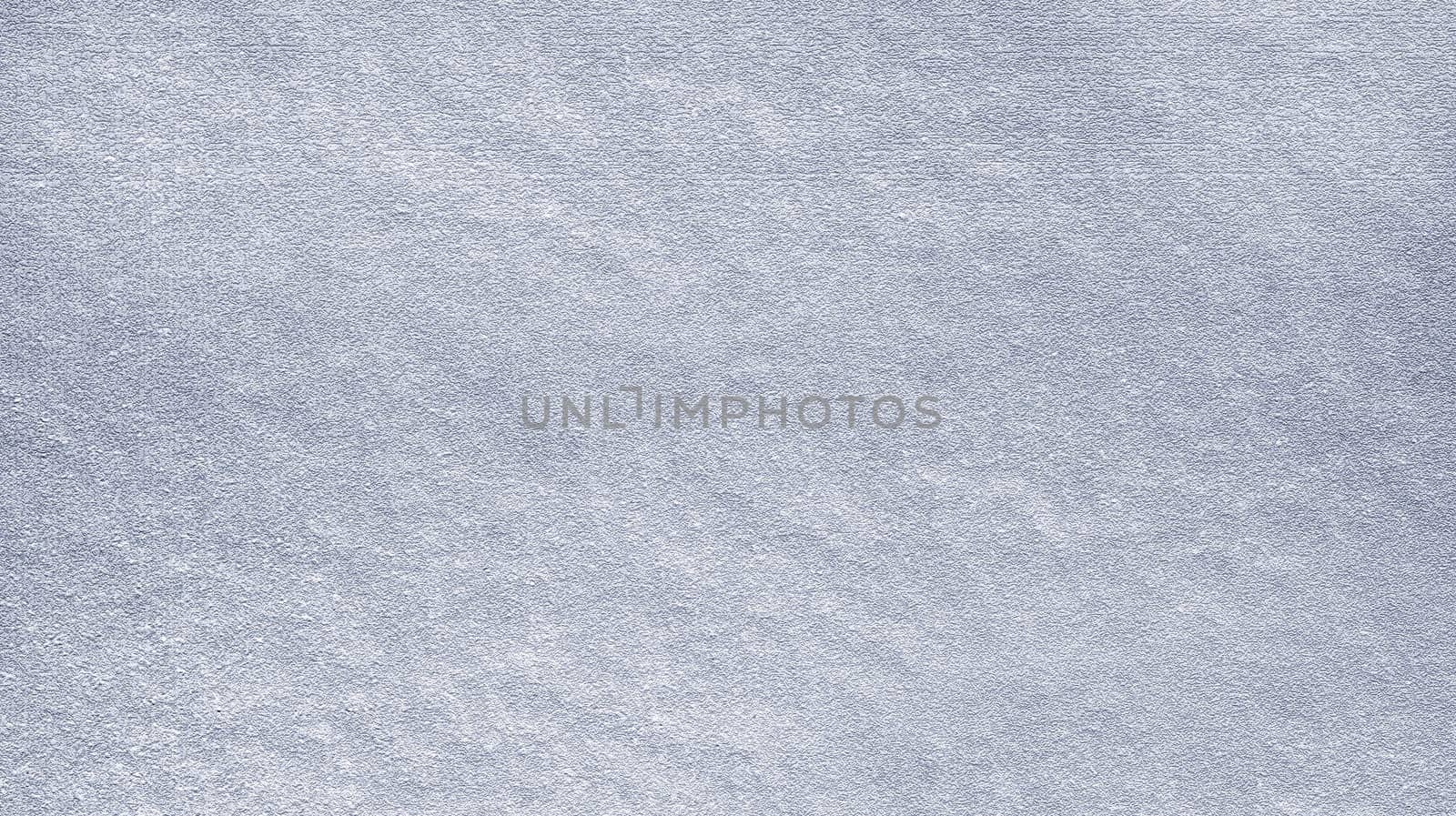 Background uneven rough gray texture on the surface in close-up