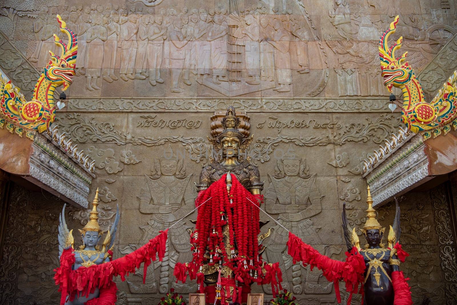 Temple guard at Wat Maha Wanaram in the city Udon Ratchathani and Province Ubon Ratchathani in Thailand.  Thailand, Ubon Ratchathani, November, 23, 2023