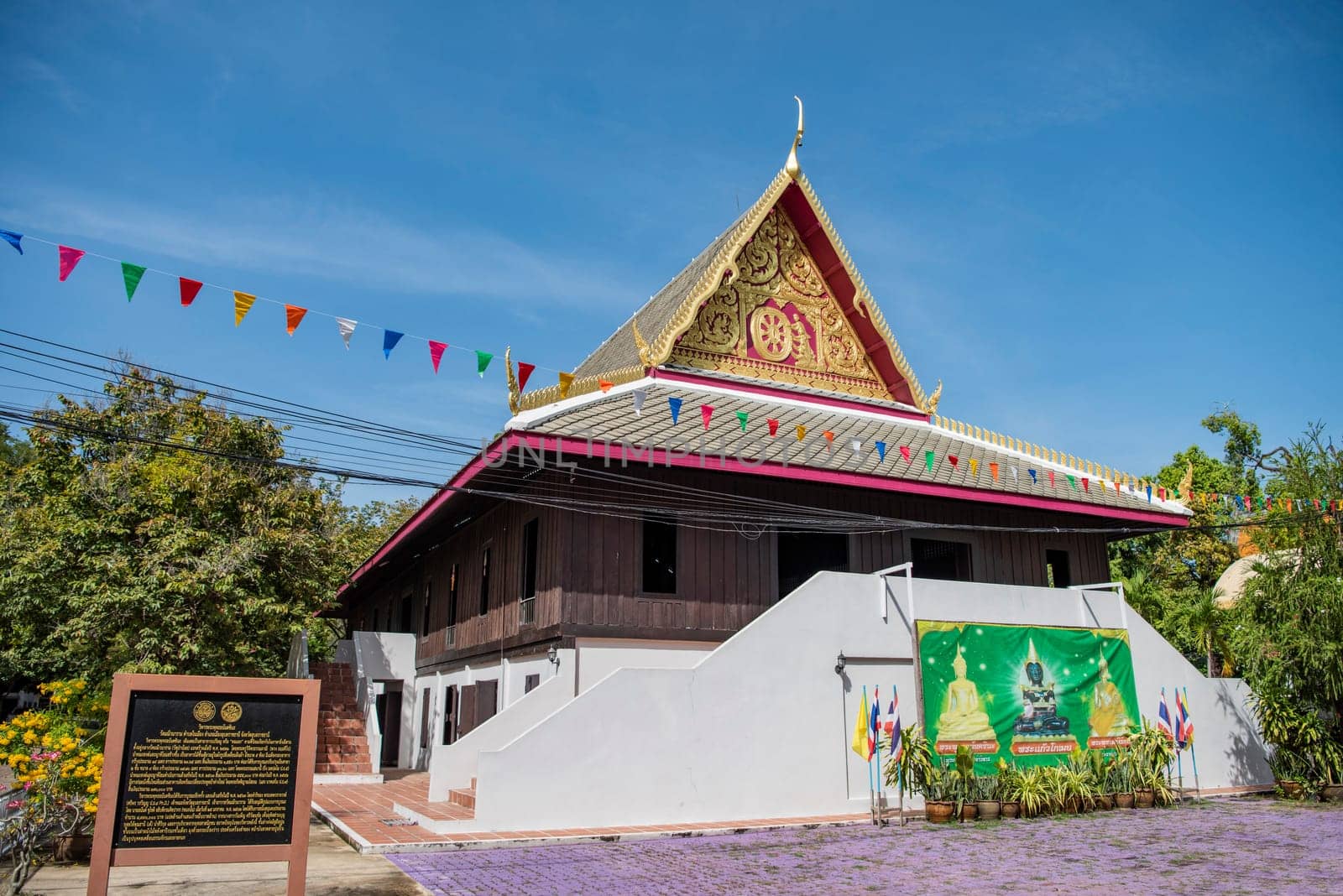 a old Wood House at Wat Mani Wanaram in the city centre of Udon Ratchathani and Province Ubon Ratchathani in Thailand.  Thailand, Ubon Ratchathani, November, 23, 2023